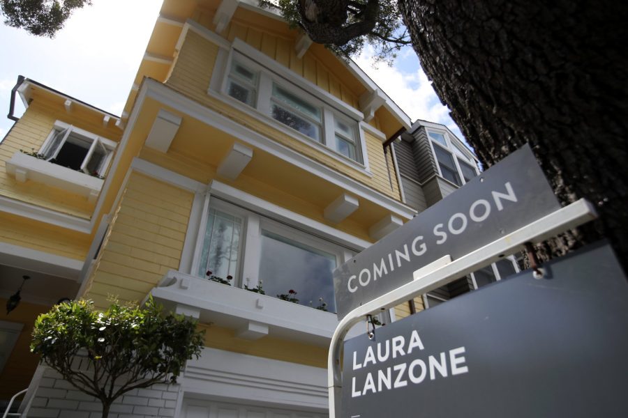 A sign is posted in front of a home that is going to be listed for sale in San Francisco on April 16, 2019. (Credit: Justin Sullivan / Getty Images)