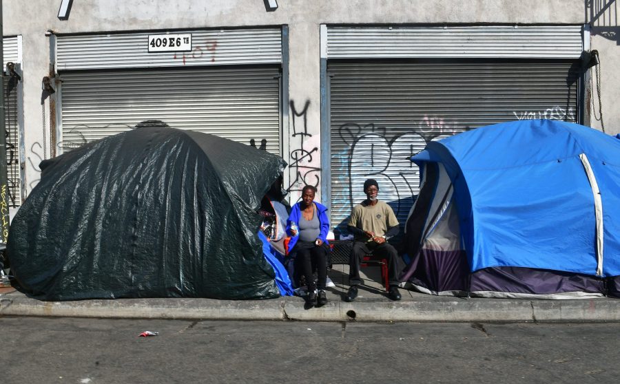 Tents for the homeless line a sidewalk in Los Angeles on Dec. 17, 2019. (Credit: Frederic J. Brown/AFP via Getty Images)