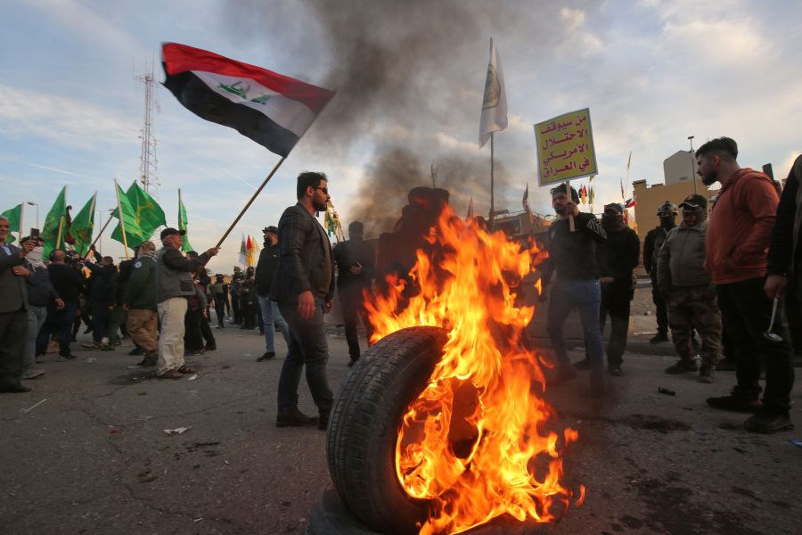 Supporters of Iraq's Hashed al-Shaabi paramilitary force protest outside the U.S. embassy in the Iraqi capital Baghdad on Jan. 1, 2020, to condemn the U.S. air strikes that killed 25 Hashed fighters over the weekend. (Credit: AHMAD AL-RUBAYE/AFP via Getty Images)