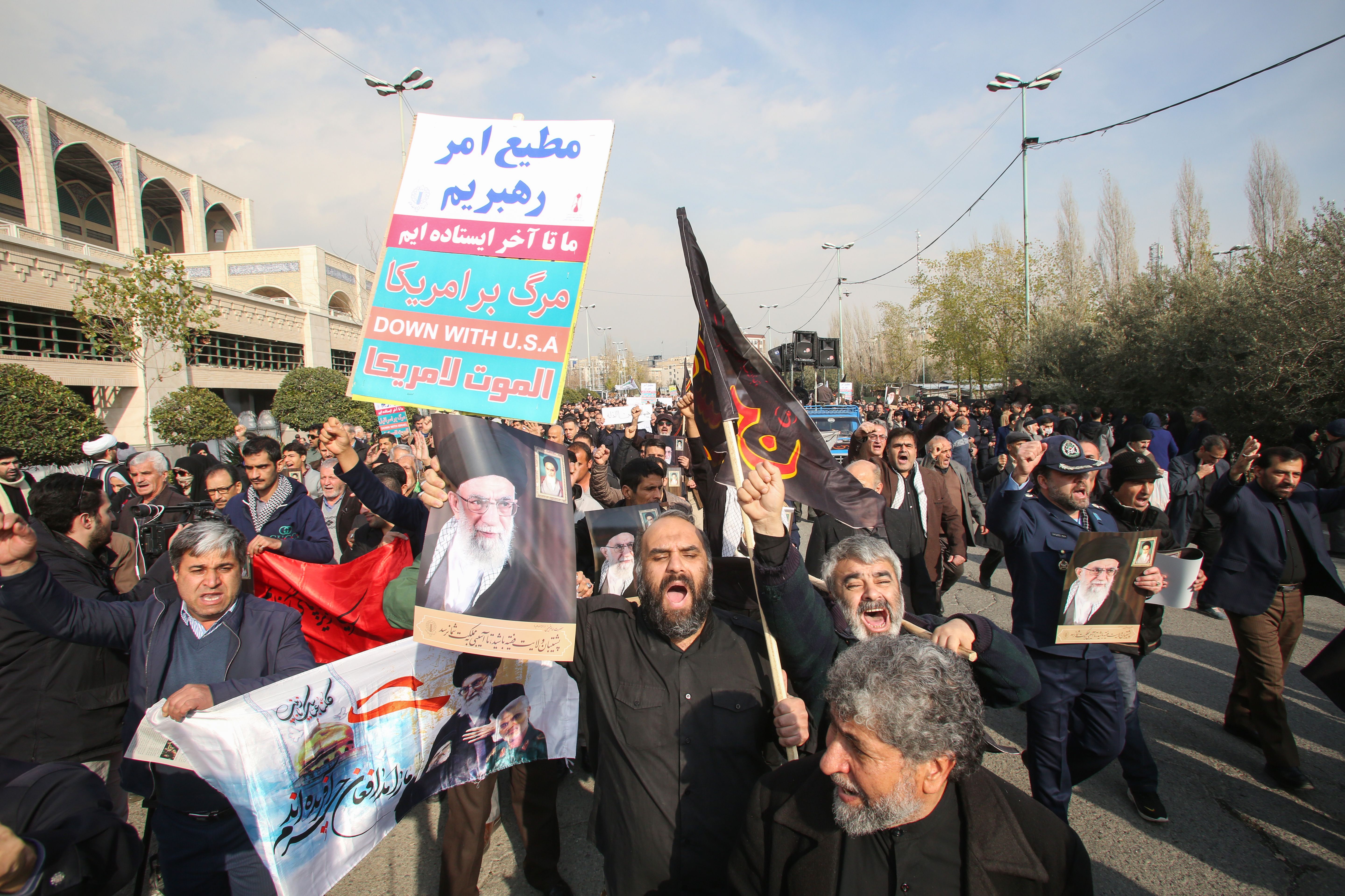 Iranians demonstrate in the capital Tehran on January 3, 2020 following the killing of Iranian Revolutionary Guards top commander Qasem Soleimani in a US strike on his convoy at Baghdad international airport. (Credit: ATTA KENARE/AFP via Getty Images)