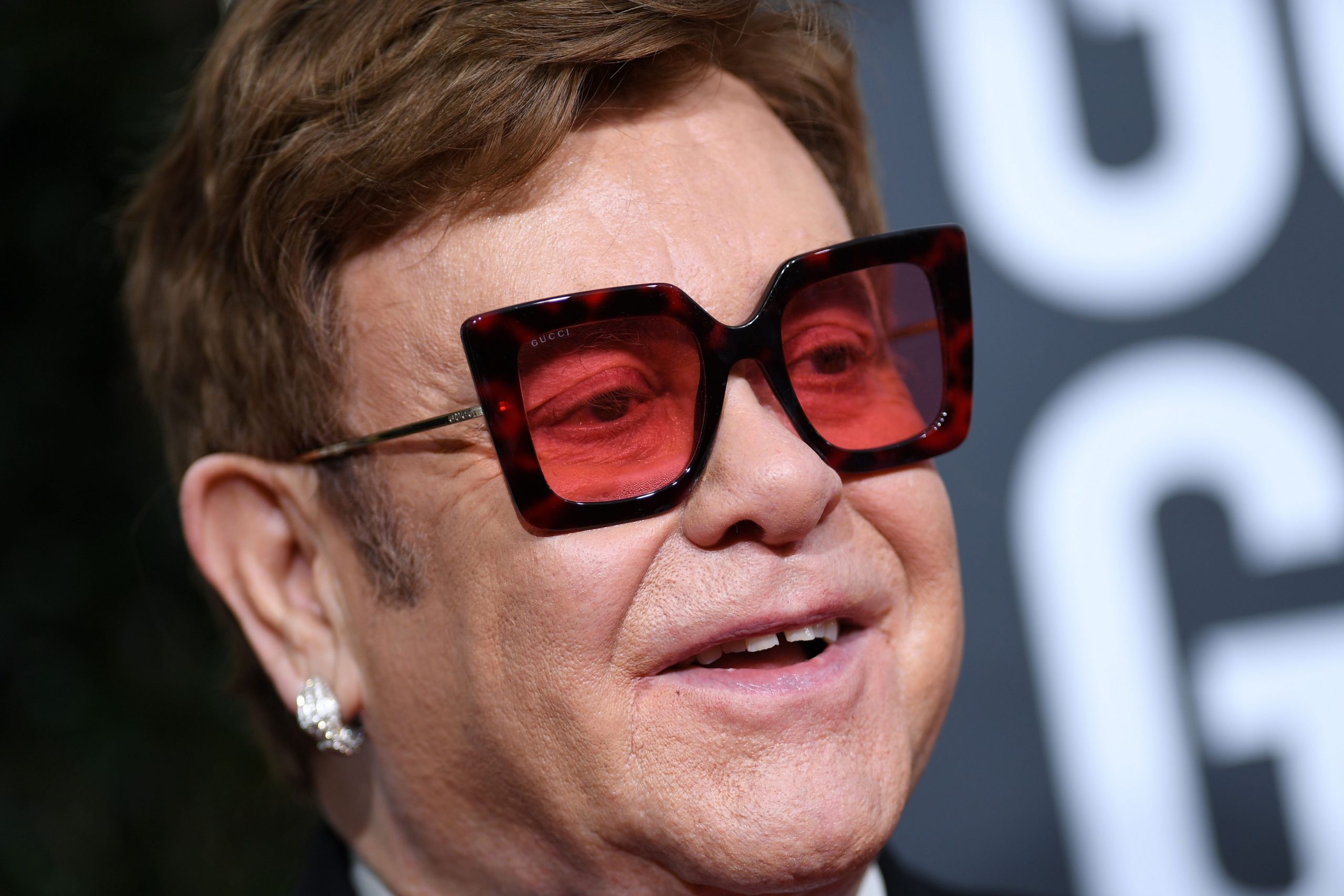 British musician Elton John arrives for the 77th annual Golden Globe Awards on Jan. 5, 2020, at The Beverly Hilton (Credit: VALERIE MACON/AFP via Getty Images)