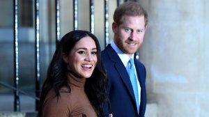 Prince Harry, Duke of Sussex and Meghan, Duchess of Sussex react after their visit to Canada House on Jan. 7, 2020 in London. (Credit: DANIEL LEAL-OLIVAS - WPA Pool/Getty Images)