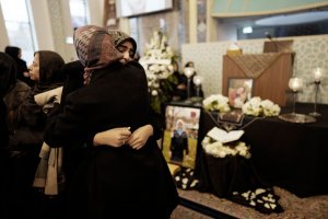 Mourners gather at the Imam Mahdi Islamic Centre in Toronto, Ontario on Jan. 12, 2020 to mourn Sahar Haghjoo and her 9-year-old daughter Elsa Jadidi, who were among the passengers of Ukrainian Airlines flight 752, which was shot down over Iran. (Credit: GEOFF ROBINS/AFP via Getty Images)