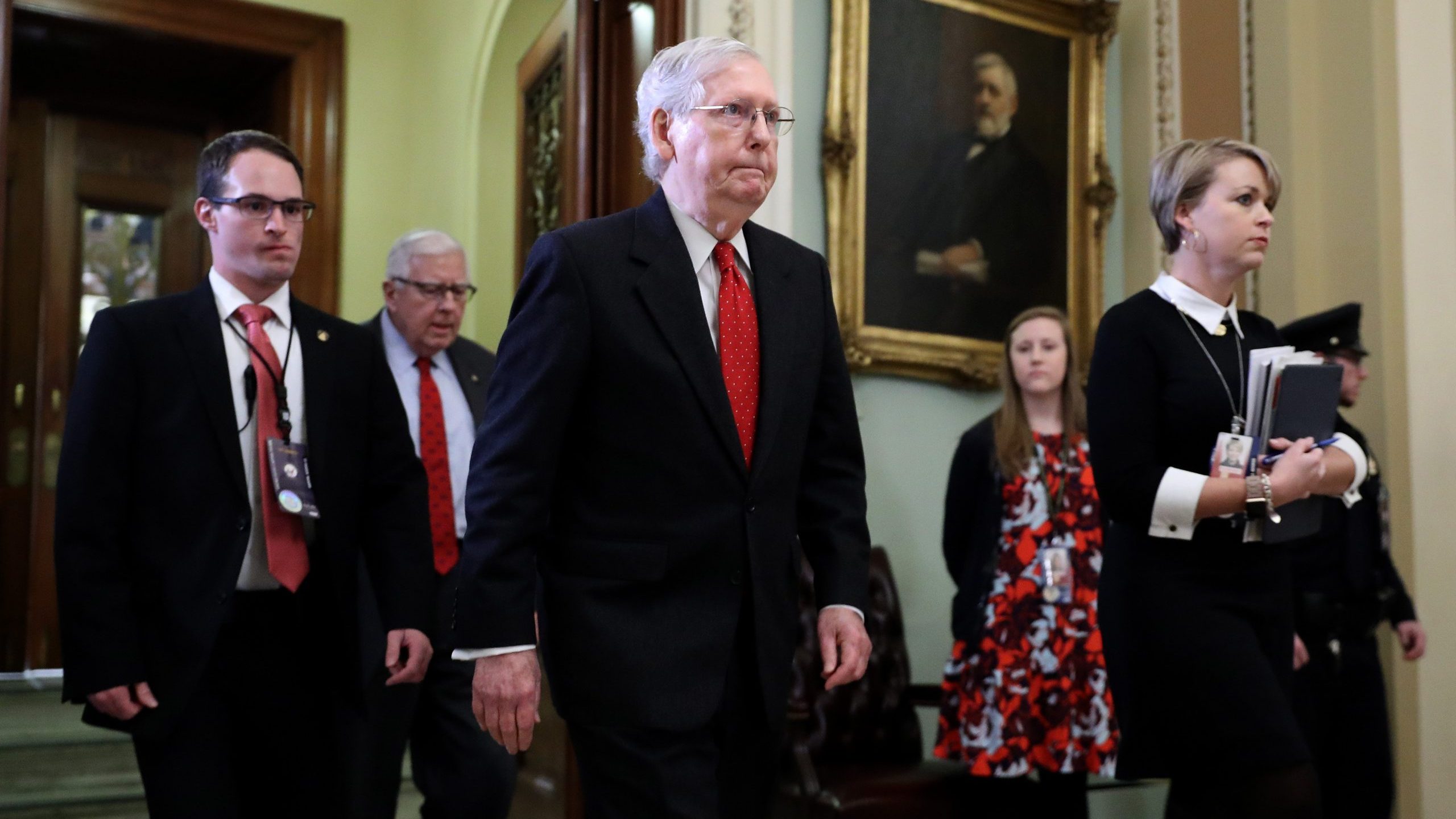 Senate Majority Leader Mitch McConnell leaves the Senate Chamber during a recess in President Donald Trump's impeachment trial on Jan. 21, 2020. (Credit: Chip Somodevilla / Getty Images)