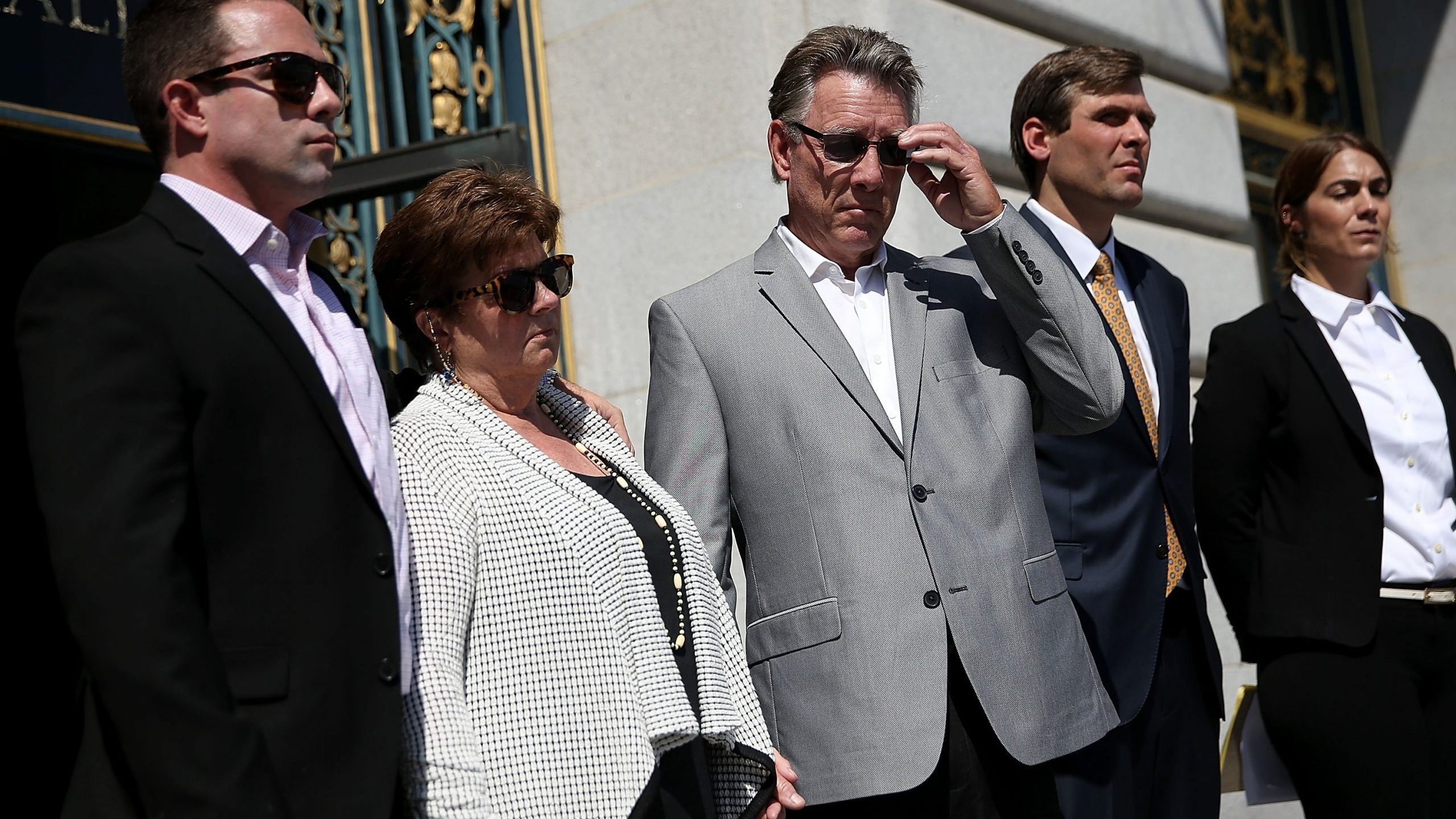 From left: Brad Steinle, Liz Sullivan and Jim Steinle, the family of Kate Steinle, look on during a news conference in San Francisco announcing their lawsuit against the government on Sept. 1, 2015. (Credit: Justin Sullivan / Getty Images)