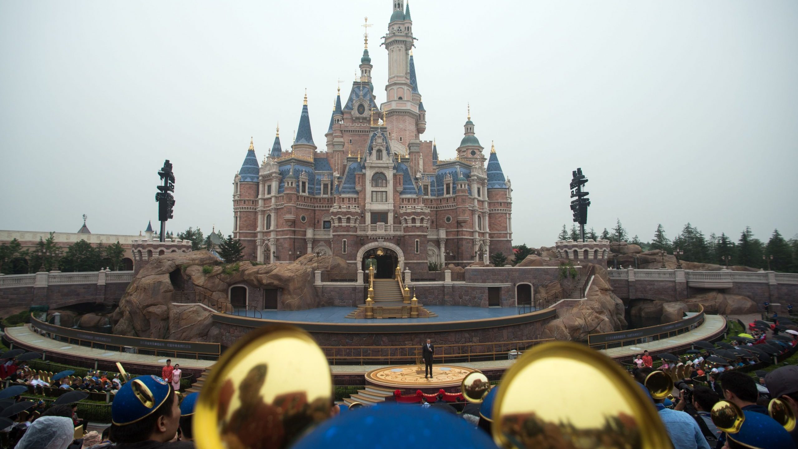 Chairman and CEO of Walt Disney Bob Iger (C) delivers a speech in front of the Enchanted Storybook Castle during the opening ceremony of the Shanghai Disney Resort in Shanghai on June 16, 2016. (Credit: JOHANNES EISELE/AFP via Getty Images)