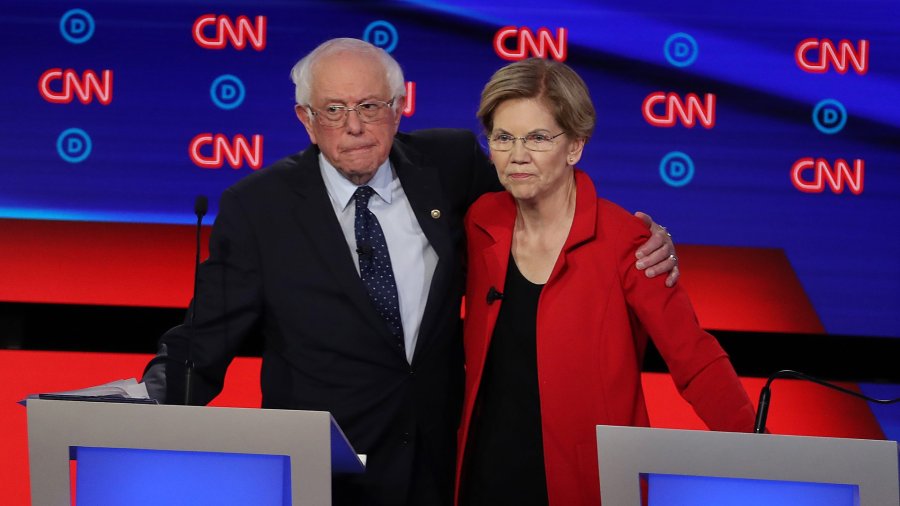 Democratic presidential candidate Sen. Bernie Sanders (I-VT) (L) and Sen. Elizabeth Warren (D-MA) embrace after the Democratic Presidential Debate at the Fox Theatre July 30, 2019 in Detroit. (Credit: Justin Sullivan/Getty Images)