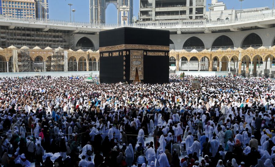 Muslim pilgrims walk around the Kaaba, Islam's holiest shrine, at the Grand Mosque in Saudi Arabia's holy city of Mecca on Feb. 27, 2020. (Abdulghani Basheer/ AFP via Getty Images)