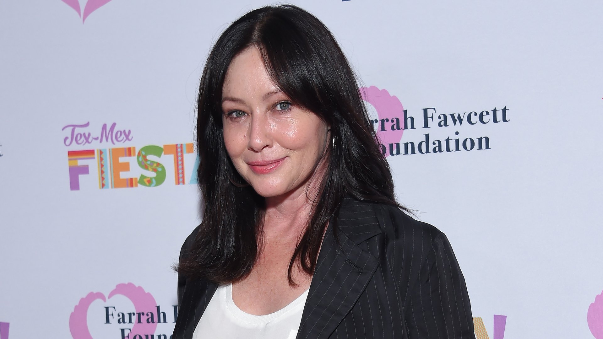 Shannen Doherty walks the carpet at the Farrah Fawcett Foundation's "Tex-Mex Fiesta" honoring Marcia Cross at Wallis Annenberg Center for the Performing Arts in Beverly Hills, California, on September 6, 2019. (Credit: LISA O'CONNOR/AFP via Getty Images)