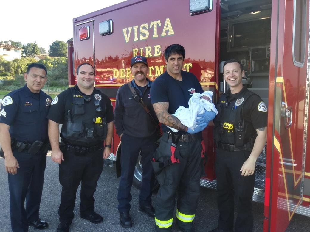 Police and firefighters assisted when a baby was born in a parked pickup on Feb. 24, 2020.(Credit: Oceanside Police Department)