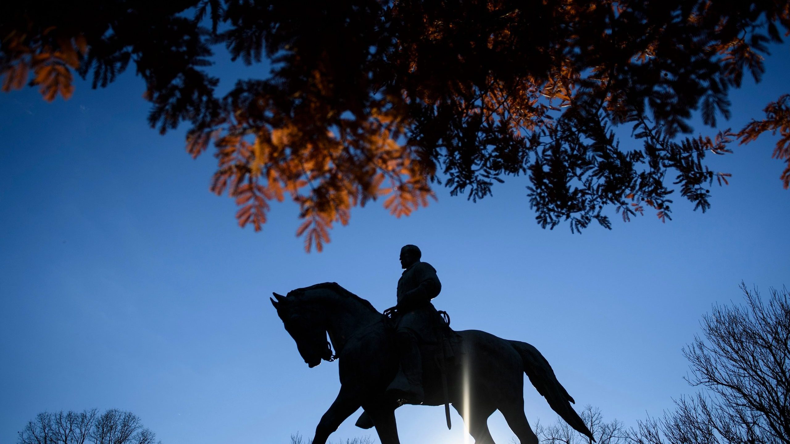 A statue of Confederate General Robert Edward Lee is seen in Market Street Park on November 26, 2018 in Charlottesville, Virginia. (Credit: BRENDAN SMIALOWSKI/AFP via Getty Images)