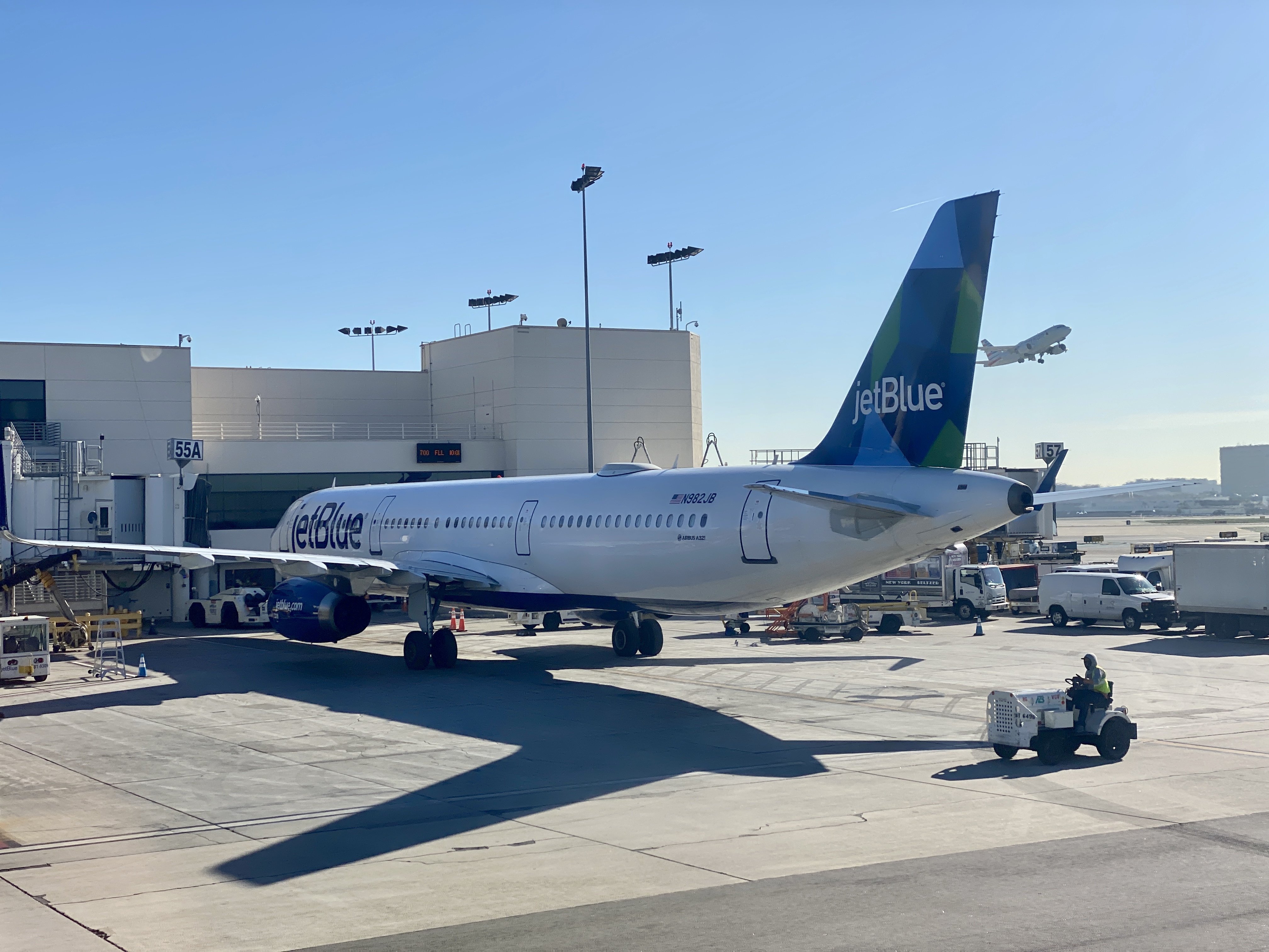 An Airbus 321 from the JetBlue airline company is seen at a gate at LAX on Jan. 6, 2020. (Credit: DANIEL SLIM/AFP via Getty Images)