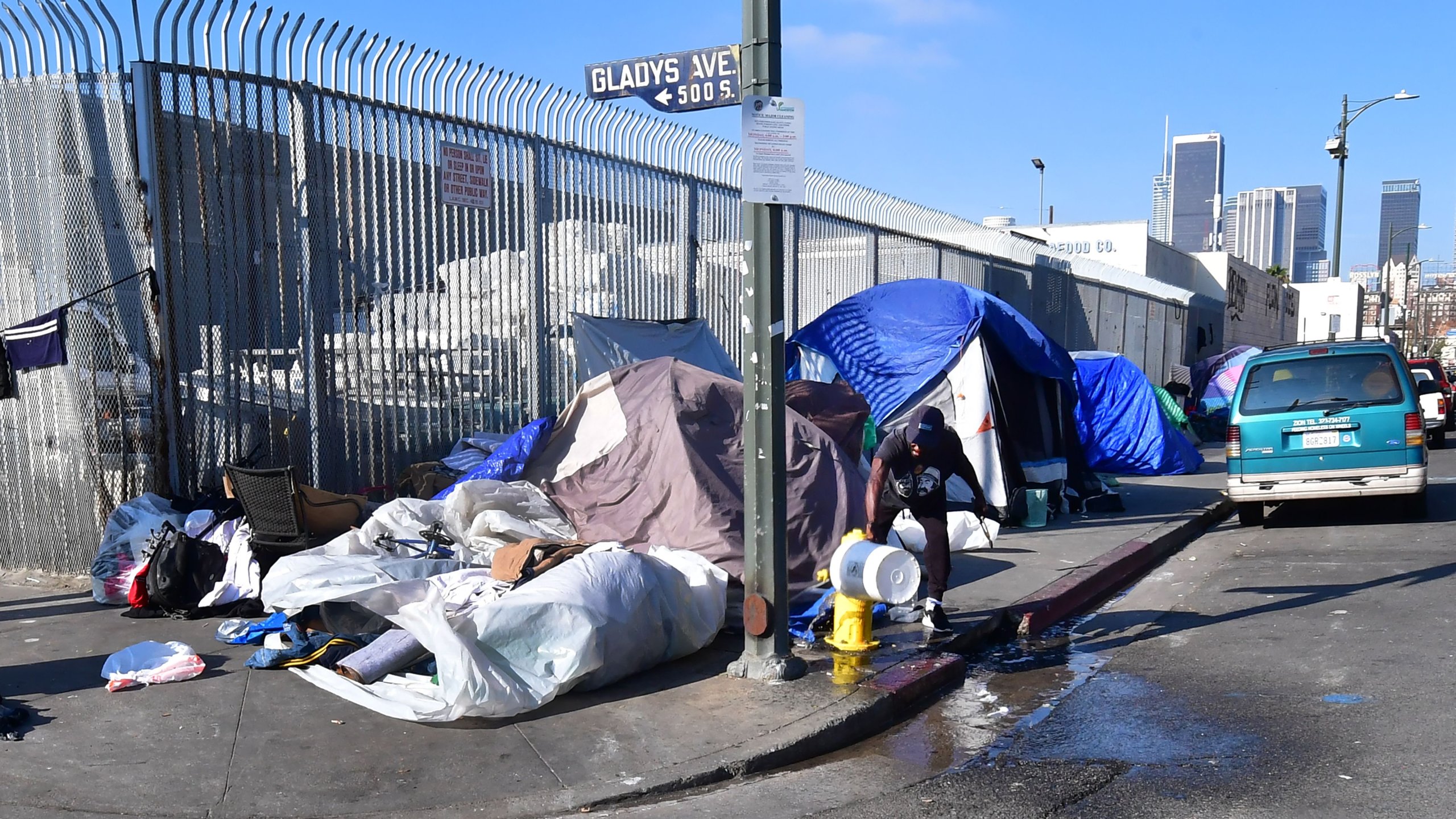 Tents of the homeless line a street corner in Los Angeles on Jan. 8, 2020. (Credit: Frederic J. Brown / AFP / Getty Images)