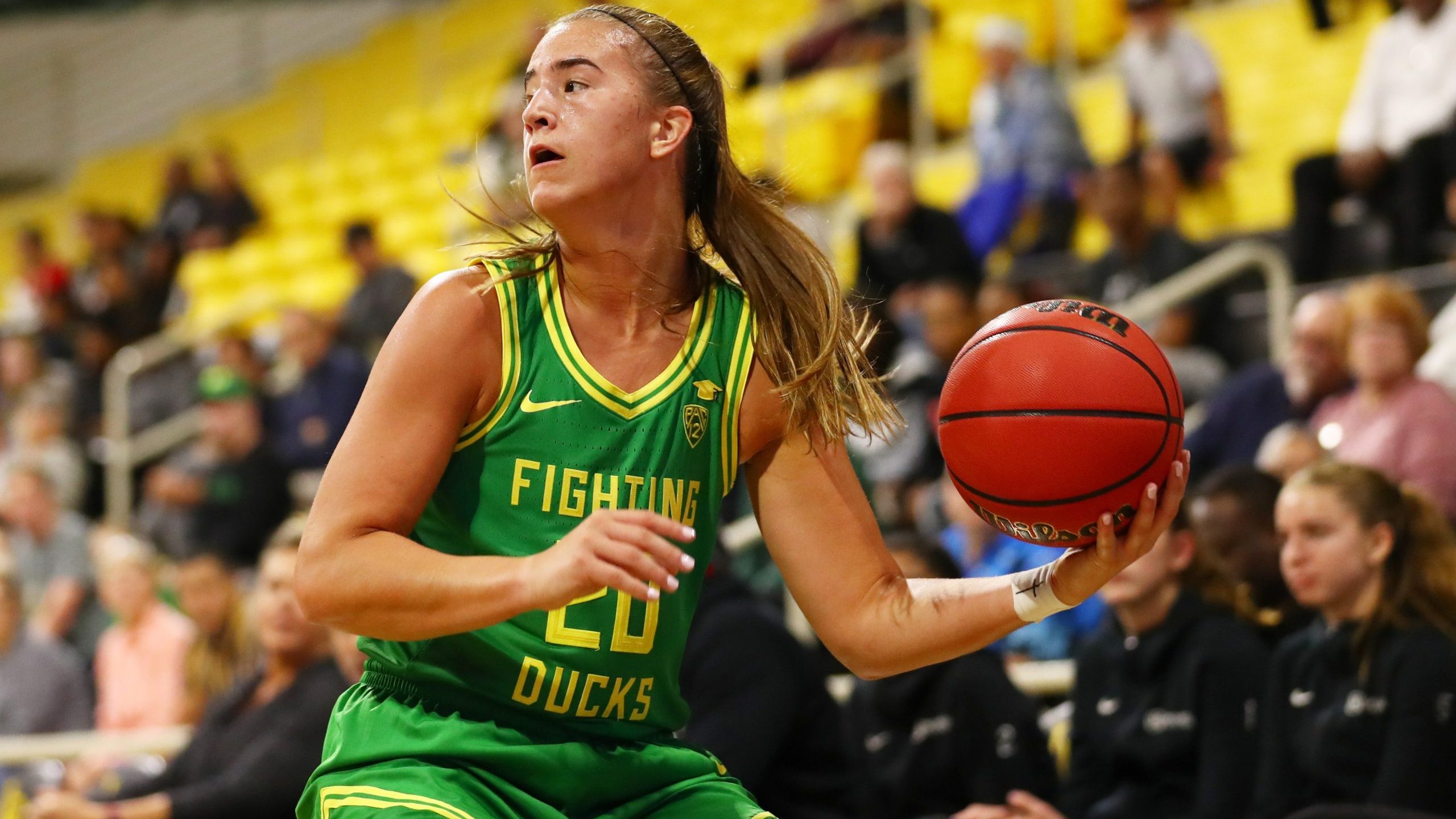 Sabrina Ionescu of the Oregon Ducks moves the ball during a game against Long Beach State at Walter Pyramid on Dec. 14, 2019. (Credit: Joe Scarnici / Getty Images)