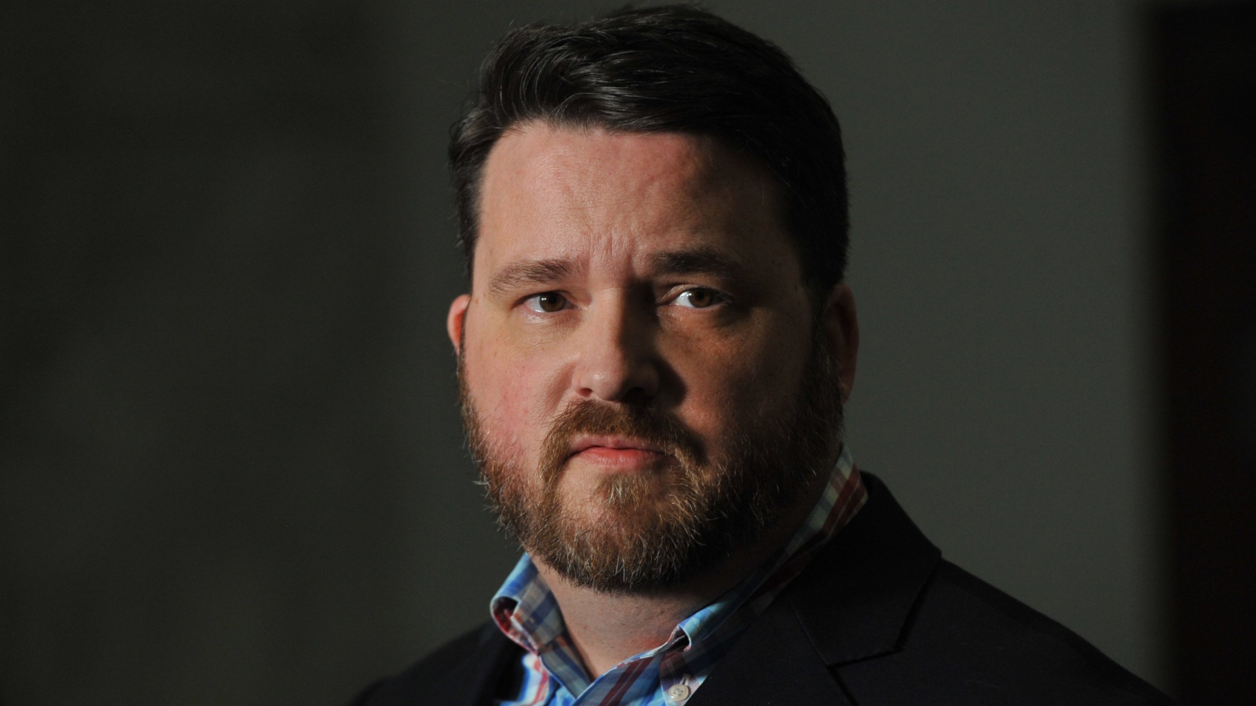 Troy Price, Chairman of the Iowa Democratic Party, addresses the media about the aftermath of the Iowa caucuses on Feb. 7, 2020. (Credit: Steve Pope/Getty Images)