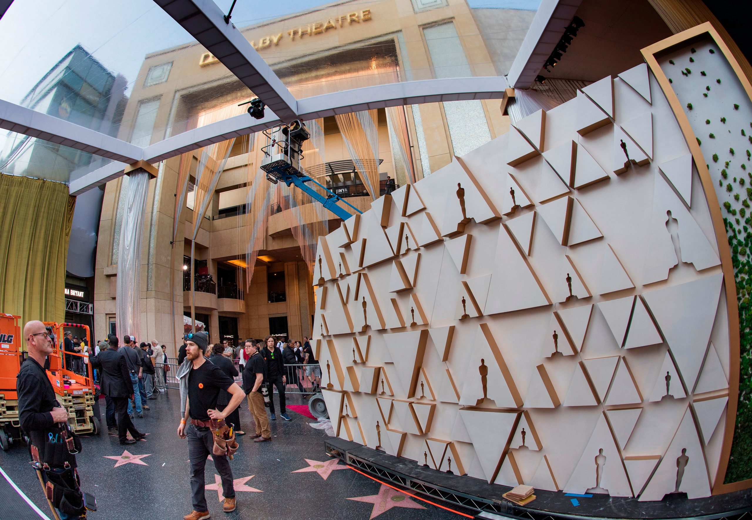 Preparations are made on the red carpet before the 92nd Oscars ceremony at the Dolby Theatre in Hollywood on Feb. 7, 2020. (Credit: MARK RALSTON/AFP via Getty Images)