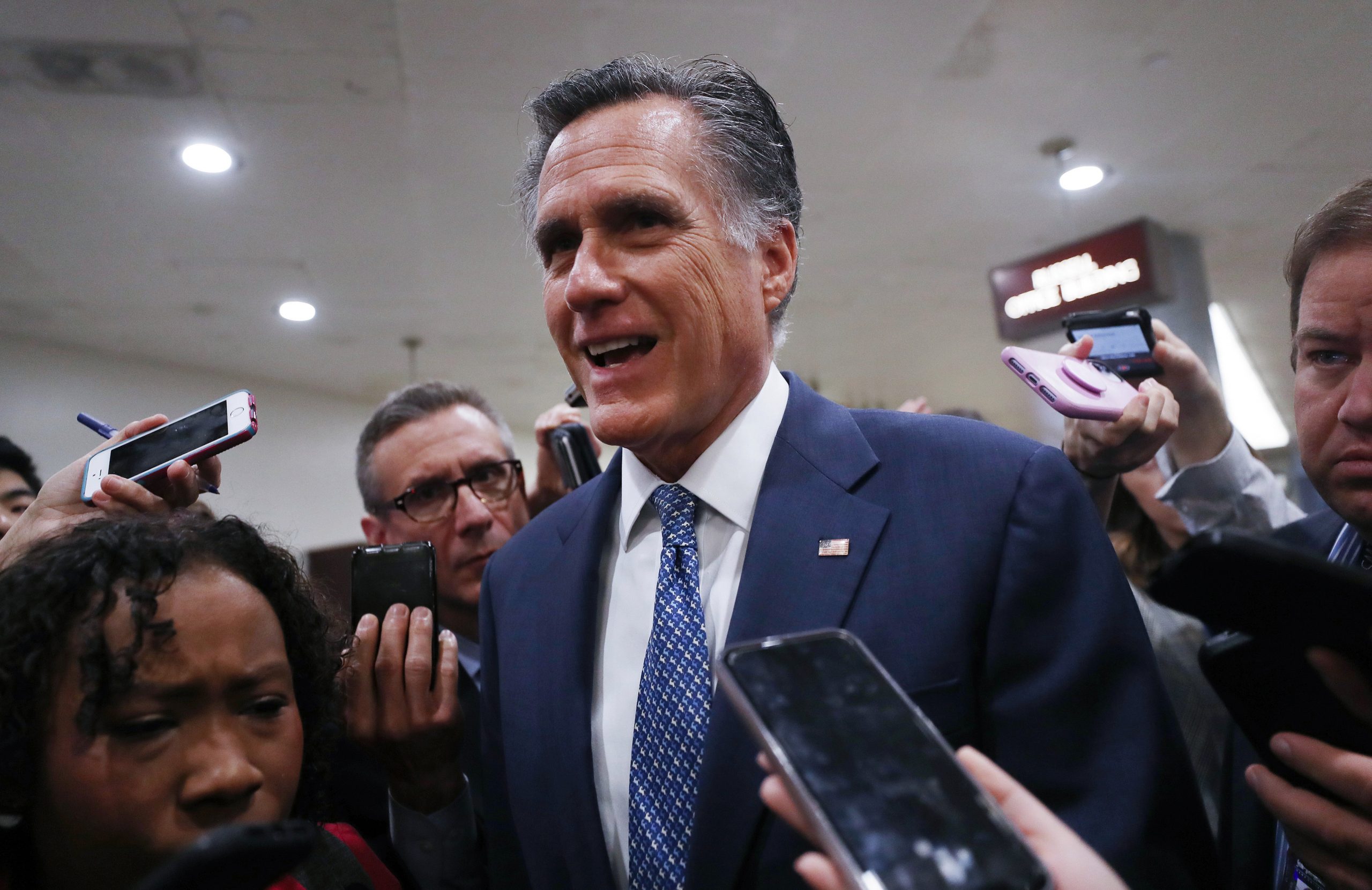 Sen. Mitt Romney (R-UT) speaks to reporters upon arrival to the U.S. Capitol for the Senate impeachment trial on Jan. 29, 2020. (Credit: Mario Tama/Getty Images)