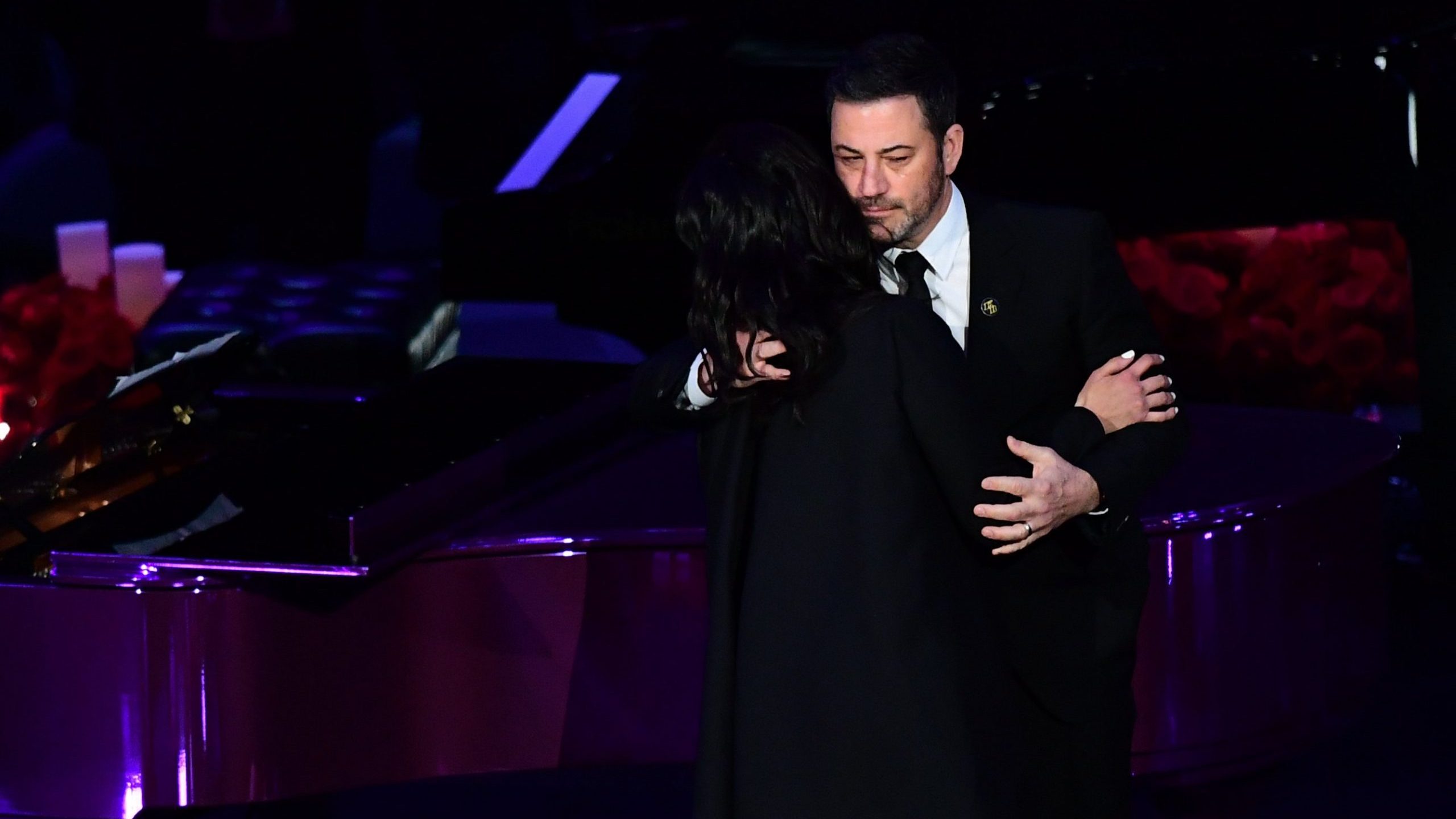 Kobe Bryant's wife Vanessa Bryant (L) hugs television host Jimmy Kimmel as she arrives to speak during the "Celebration of Life for Kobe and Gianna Bryant" service at Staples Center in Downtown Los Angeles on Feb. 24, 2020. (Credit: Frederic J. Brown/ AFP)