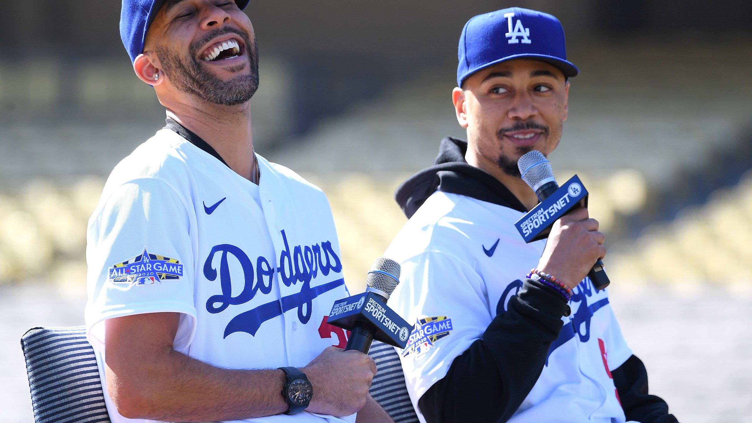 David Price #33 and Mookie Betts #50 of the Los Angeles Dodgers answer questions from the media during an introductory press conference at Dodger Stadium on Feb. 12, 2020. (Credit: Jayne Kamin-Oncea/Getty Images)