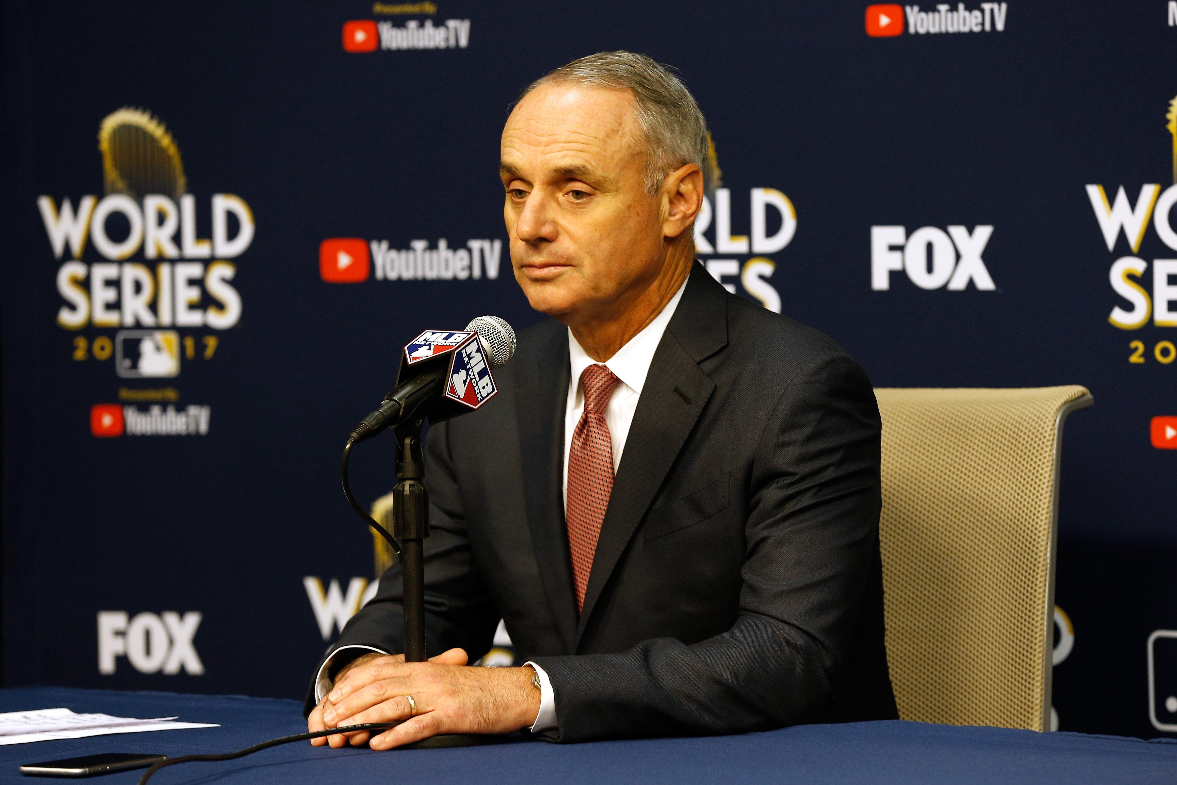 Major League Baseball Commissioner Robert D. Manfred Jr. speaks to the media during a press conference prior to game four of the 2017 World Series between the Houston Astros and the Los Angeles Dodgers at Minute Maid Park on October 28, 2017 in Houston. (Credit: Bob Levey/Getty Images)