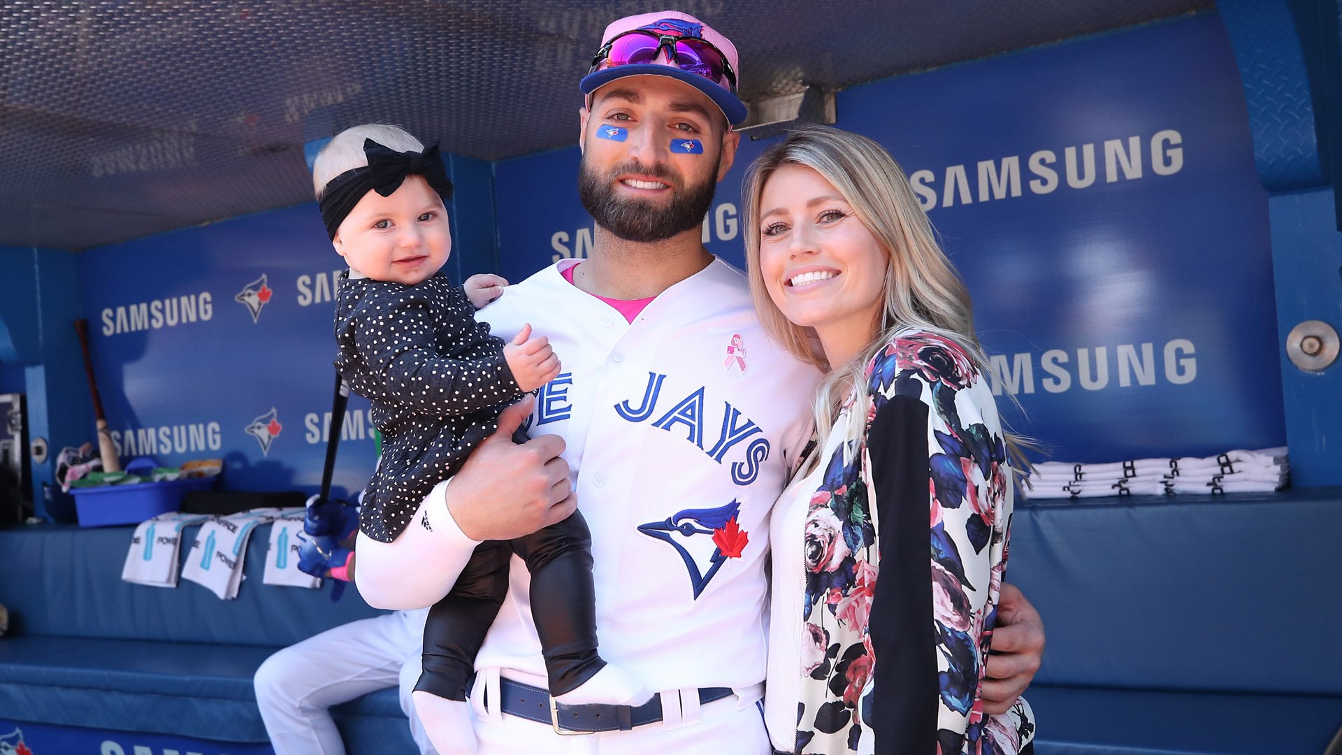 Kevin Pillar, formerly #11 of the Toronto Blue Jays, poses with his wife and baby on Mother's Day before the start of MLB game action against the Boston Red Sox at Rogers Centre on May 13, 2018, in Toronto, Canada. (Credit: Tom Szczerbowski/Getty Images)