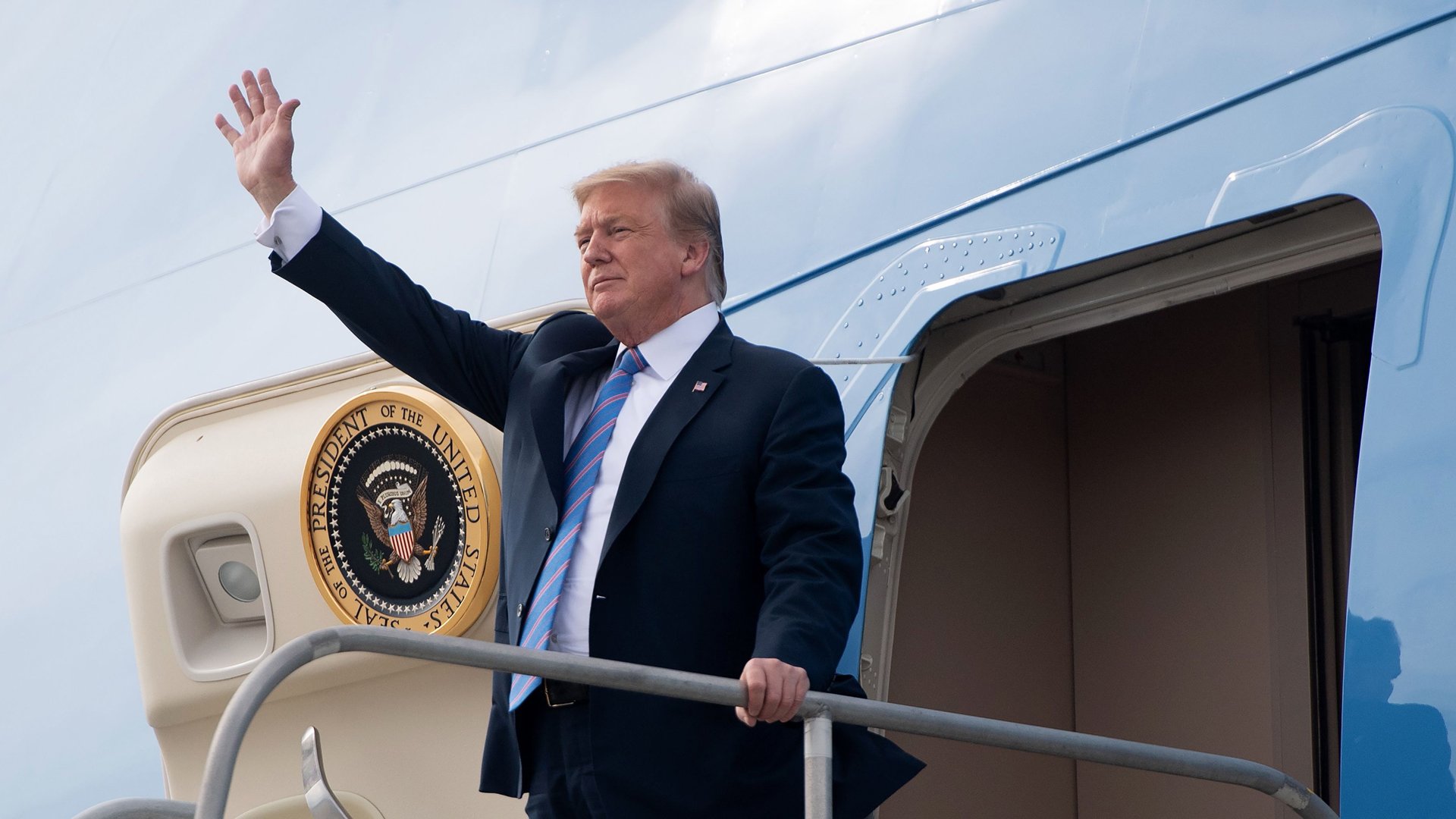 President Donald Trump disembarks from Air Force One upon arrival at Los Angeles International Airport on April 5, 2019. (Credit: Saul Loeb / AFP / Getty Images)