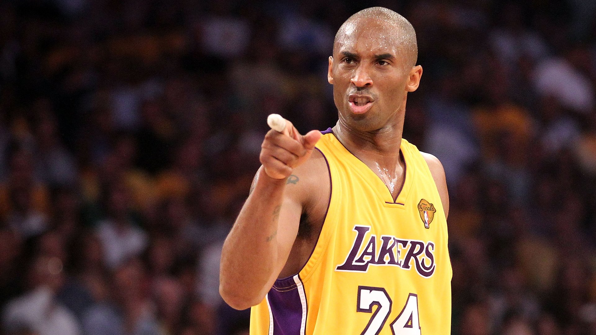 Kobe Bryant points during Game Seven of the 2010 NBA Finals against the Boston Celtics at Staples Center on June 17, 2010. (Credit: Ronald Martinez / Getty Images)