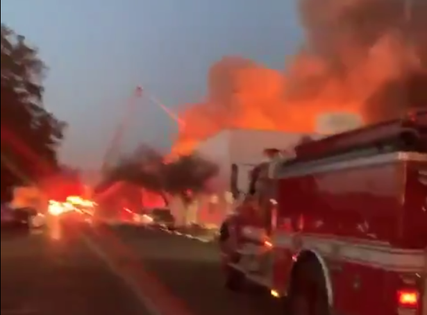 Firefighters respond to a blaze at the Porterville Public Library on Feb. 18, 2020. (Credit: Naji Abdullah)