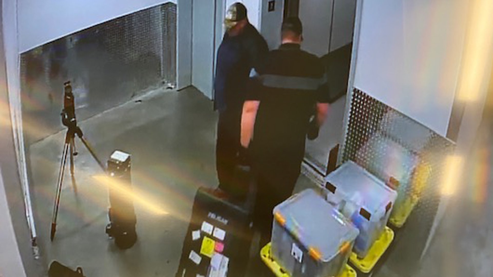 Undated surveillance video shows two burglary suspects at a La Mirada public storage facility.