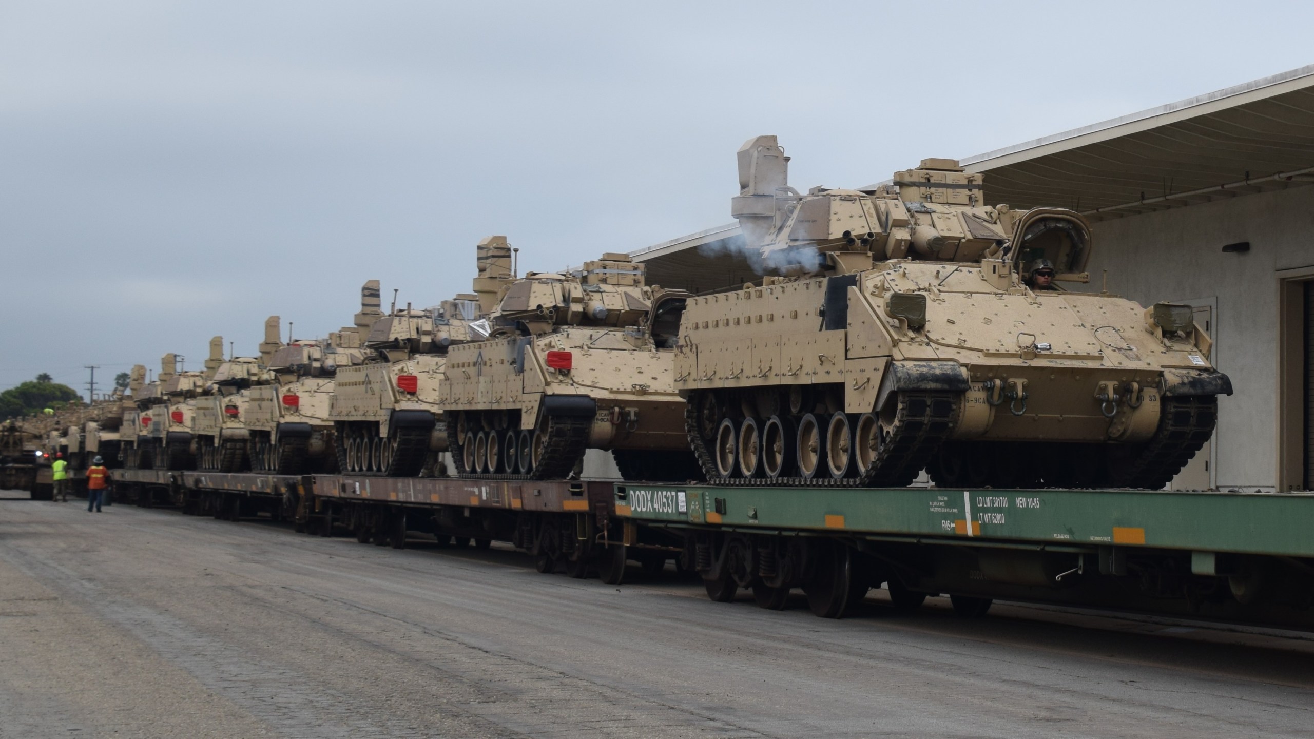 A photo shared by Naval Base Ventura County shows tanks being hauled on a train on March 24, 2020.