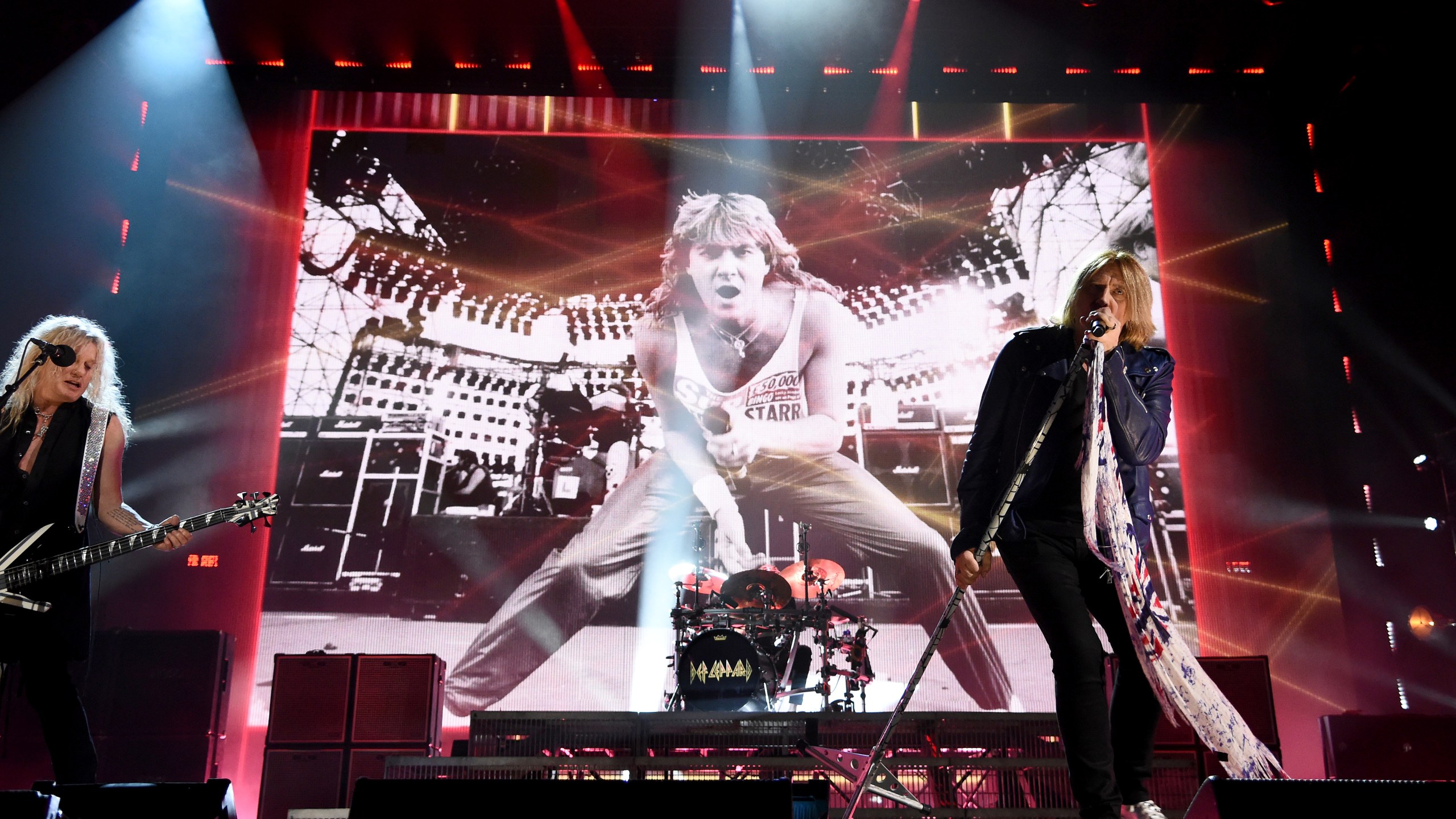 Rock and Roll Hall of Fame inductees Rick Savage and Joe Elliott of Def Leppard perform at the 2019 Rock & Roll Hall Of Fame Induction Ceremony - Show at Barclays Center on March 29, 2019 in New York City. (Dimitrios Kambouris/Getty Images For The Rock and Roll Hall of Fame)