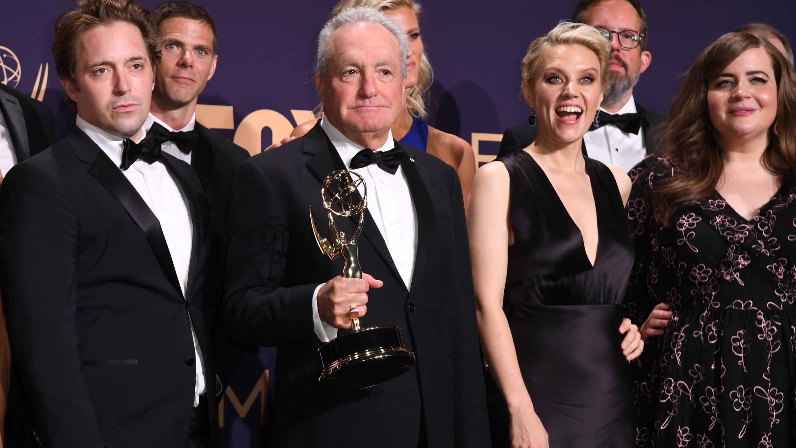 Producer Lorne Michaels and cast members pose with the Outstanding Variety Sketch Series award for "Saturday Night Live" during the 71st Emmy Awards at the Microsoft Theatre in Los Angeles on Sept. 22, 2019. (ROBYN BECK/AFP via Getty Images)