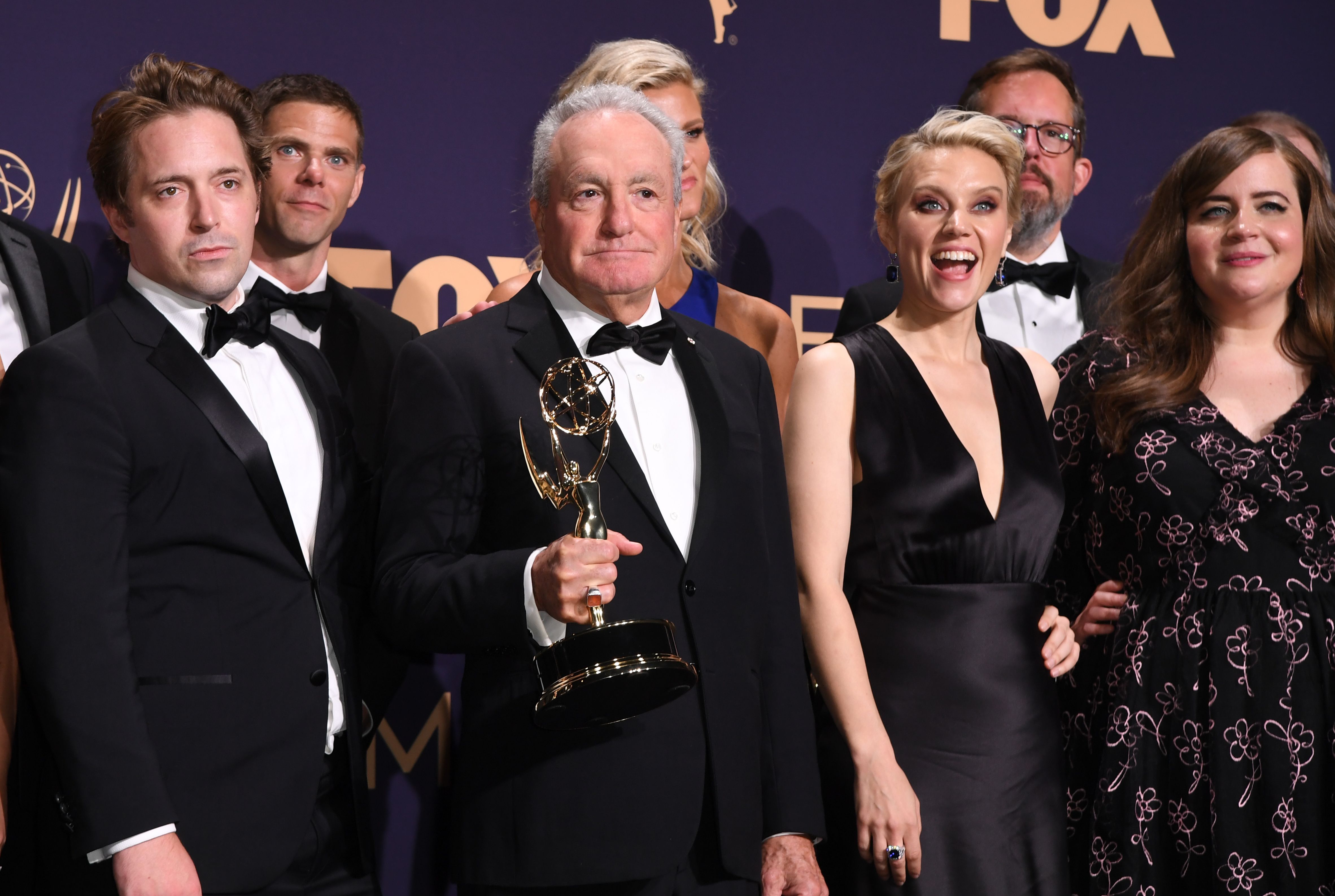 Producer Lorne Michaels and cast members pose with the Outstanding Variety Sketch Series award for "Saturday Night Live" during the 71st Emmy Awards at the Microsoft Theatre in Los Angeles on Sept. 22, 2019. (ROBYN BECK/AFP via Getty Images)