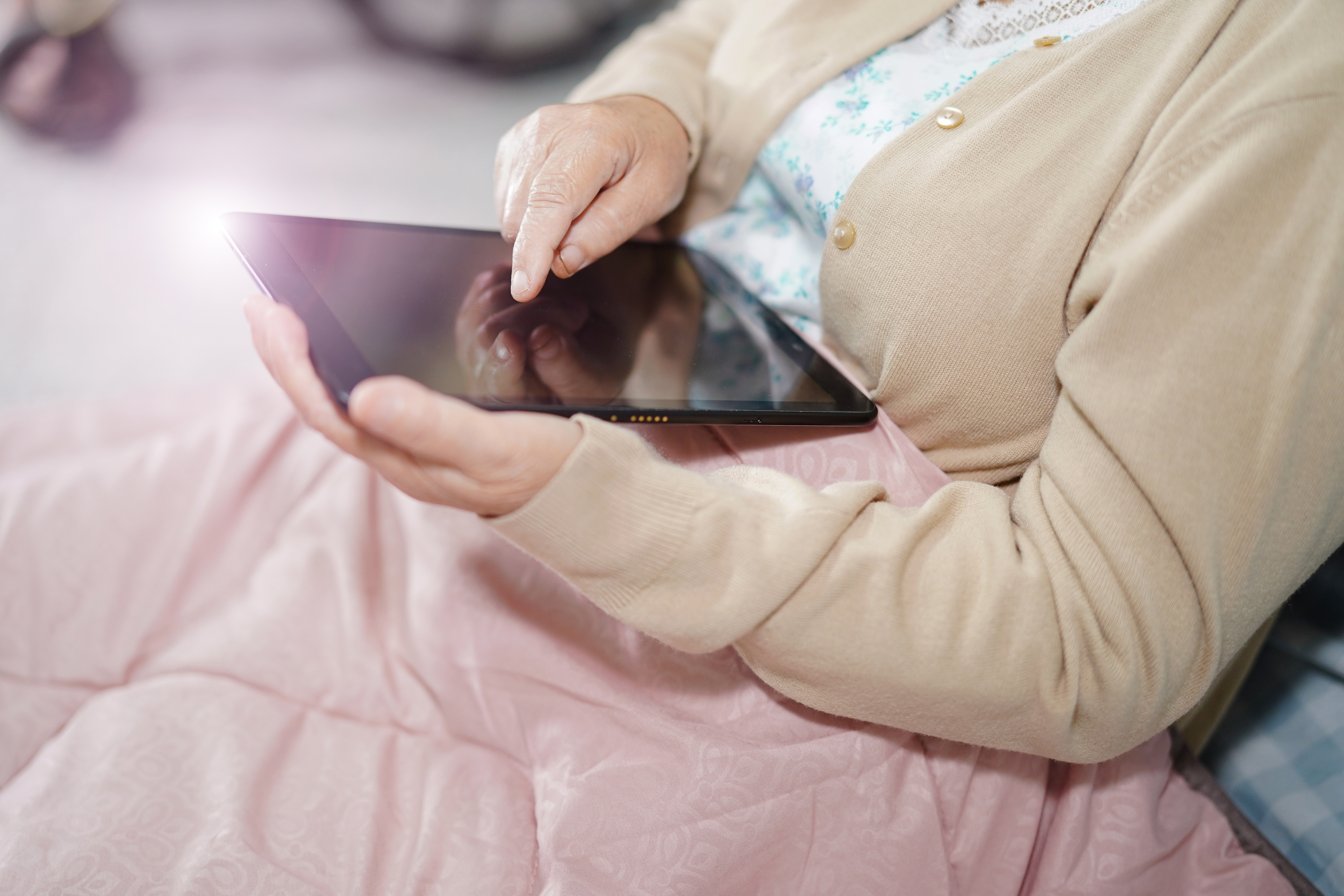 A woman holds a tablet in this file photo. (Getty Images)