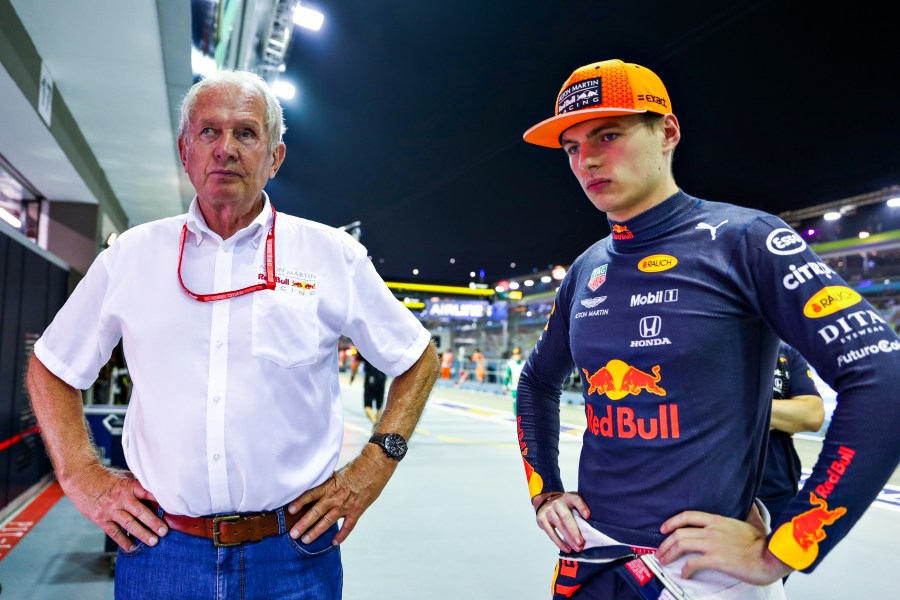 Max Verstappen of Netherlands, right, and Red Bull racing team consultant Helmut Marko look on during a qualifying race for the F1 Grand Prix of Singapore at Marina Bay Street Circuit on Sept. 21, 2019 in Singapore. (Mark Thompson/Getty Images)