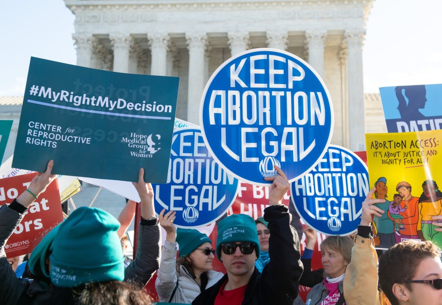 Pro-choice activists supporting legal access to abortion protest during a demonstration outside the U.S. Supreme Court in Washington, DC, March 4, 2020. (SAUL LOEB/AFP via Getty Images)