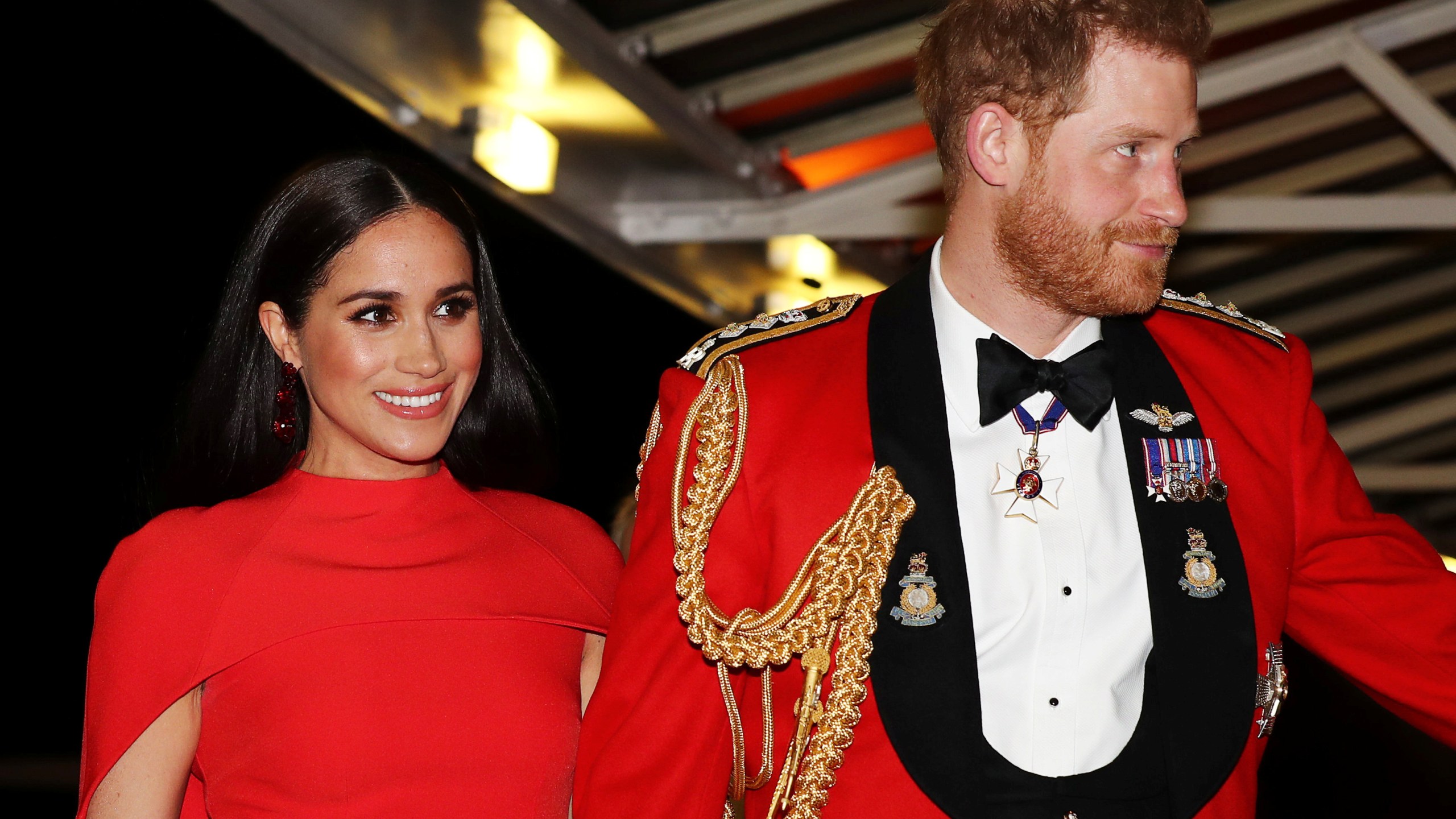 Britain's Prince Harry, Duke of Sussex and Meghan, Duchess of Sussex attend The Mountbatten Festival of Music at the Royal Albert Hall in London on March 7, 2020. (Simon Dawson/POOL/AFP via Getty Images)