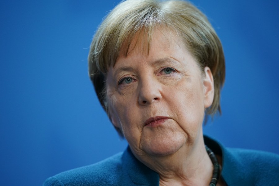 German Chancellor Angela Merkel speaks to reporters to announce further measures to combat the spread of the coronavirus and COVID-19, the disease the virus causes, after she held a teleconference with the governors of Germany's 16 states on March 22, 2020, in Berlin, Germany. (Clemens Bilan - Pool/Getty Images)