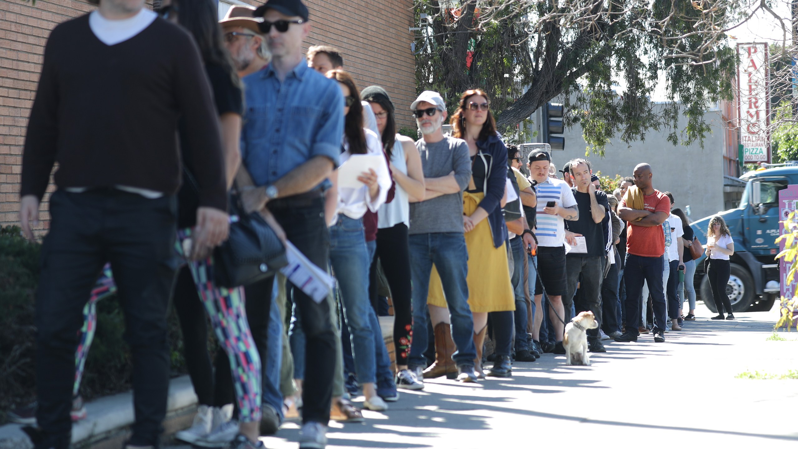 Voters wait in line to cast their ballots at a vote center at a Masonic Lodge in Los Angeles on March 3, 2020. (Mario Tama/Getty Images)