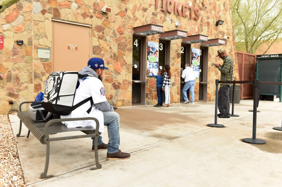 Los Angeles Dodgers fans wait in the ticket line to get refunds at Camelback Ranch after Major League Baseball suspends Spring Training on March 12, 2020 in Glendale, Arizona. (Norm Hall/Getty Images)