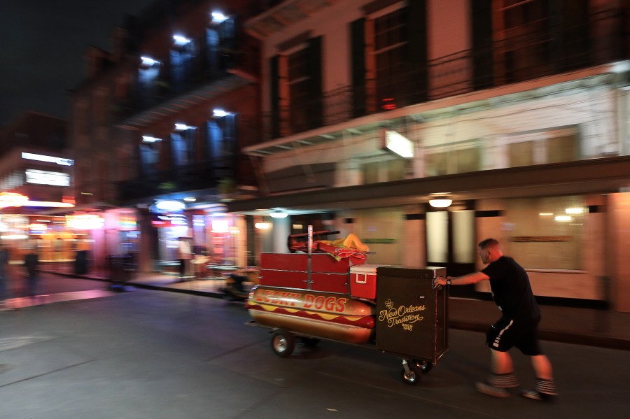 A Lucky Dog vendor leaves Bourbon Street as Louisiana Governor John Bel Edwards orders bars, gyms and casinos to close until April 13th due to the spread of coronavirus on March 16, 2020, in New Orleans, Louisiana. (Chris Graythen/Getty Images)