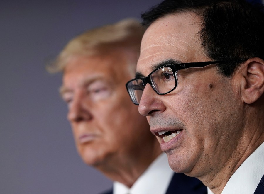 Treasury Secretary Steven Mnuchin (R) speaks while flanked by President Donald Trump during a briefing about the coronavirus in the press briefing room at the White House on March 17, 2020. (Drew Angerer/Getty Images)