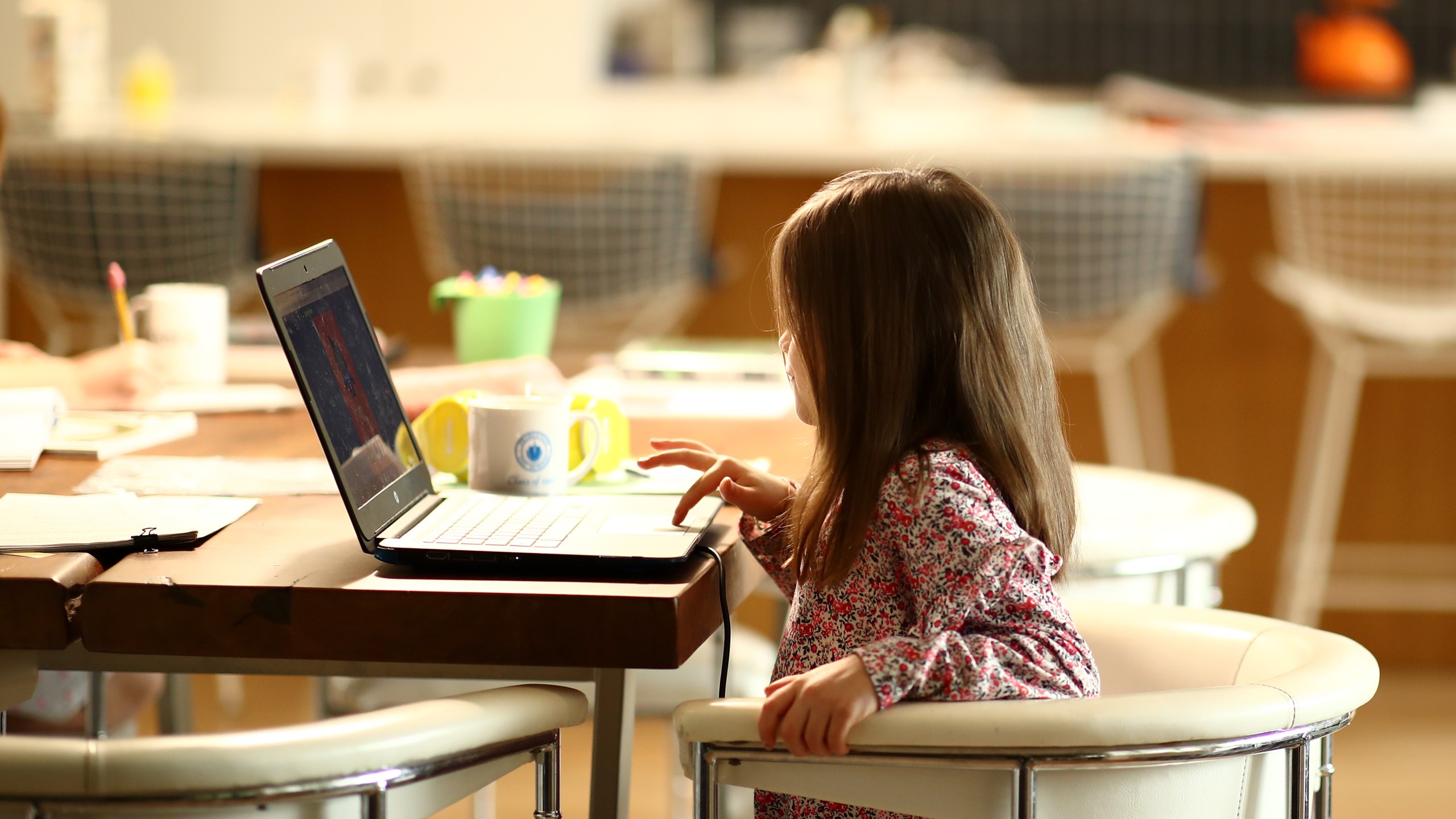 A kindergartener does schoolwork at her home on March 18, 2020, in San Anselmo, California.(Ezra Shaw/Getty Images)