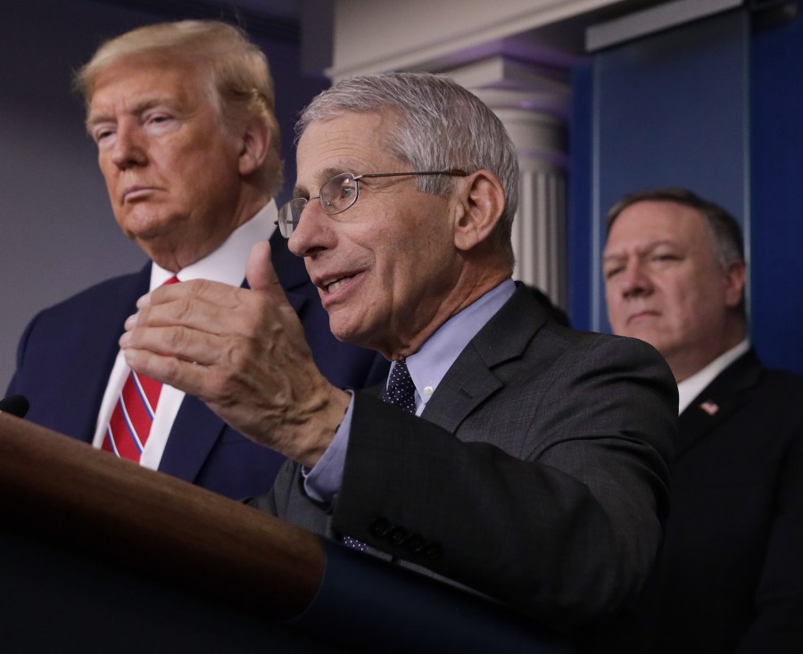 Dr. Anthony Fauci,director of the National Institute of Allergy and Infectious Diseases, speaks while President Donald Trump and Secretary of State Mike Pompeo listen during a briefing on the latest development of the coronavirus outbreak in the U.S. in the James Brady Press Briefing Room at the White House March 20, 2020. (Alex Wong/Getty Images)