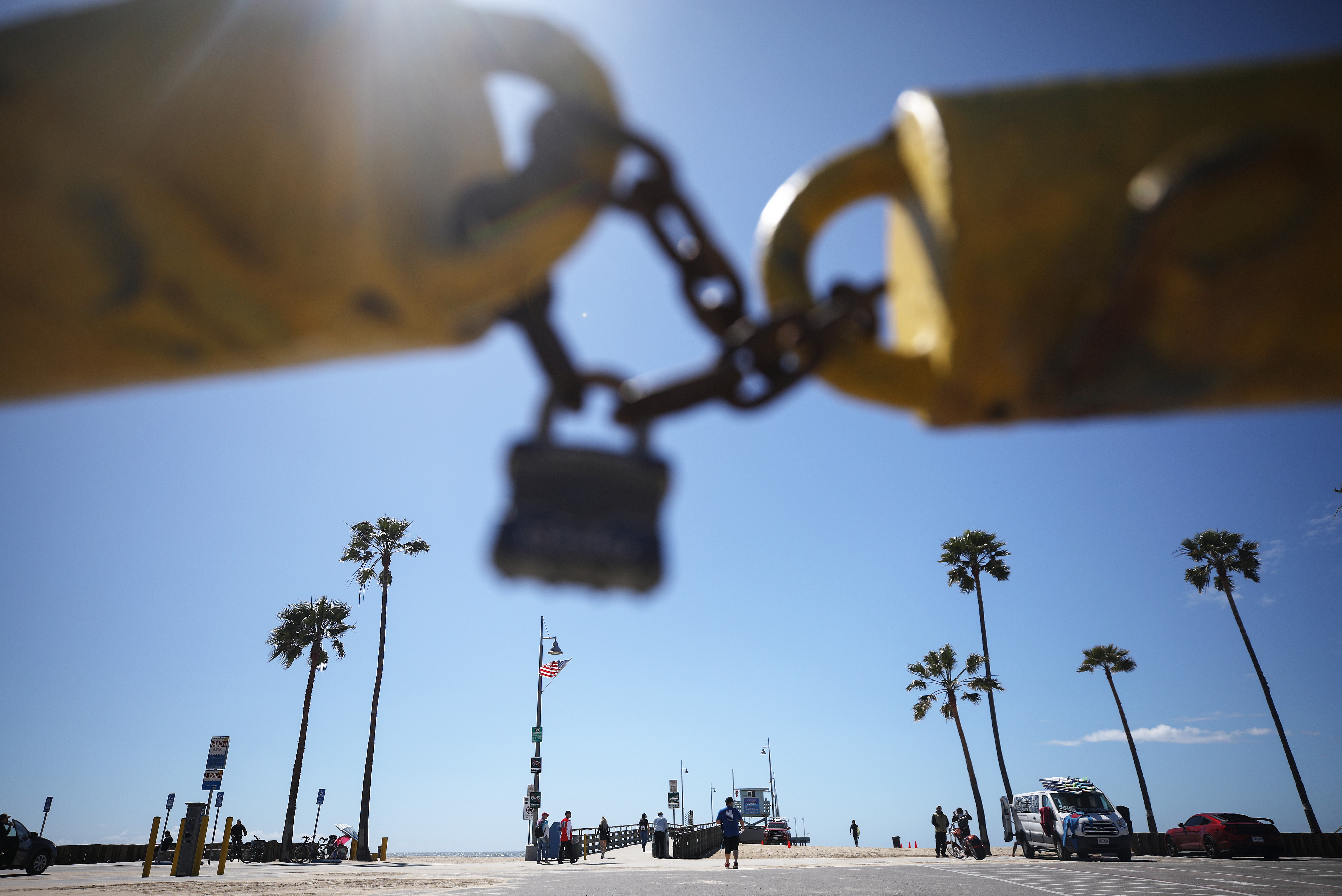 The main Venice Beach parking lot is seen locked on March 23, 2020, in Venice. (Mario Tama/Getty Images)