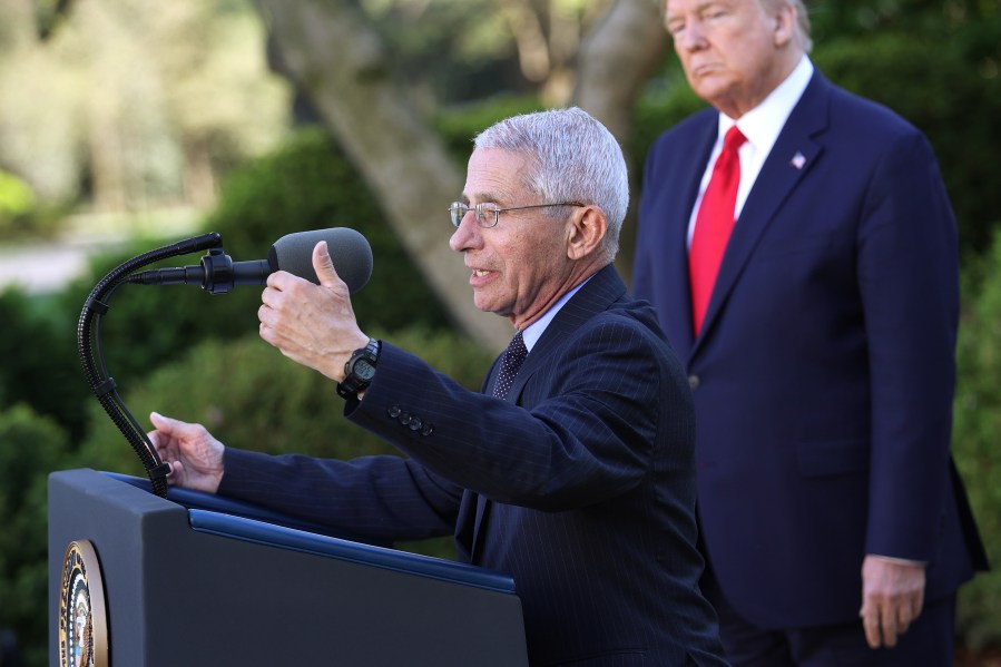 National Institute of Allergy and Infectious Diseases Director Anthony Fauci speaks as U.S. President Donald Trump listens during the daily coronavirus briefing at the Rose Garden of the White House on March 30, 2020. (Win McNamee/Getty Images)