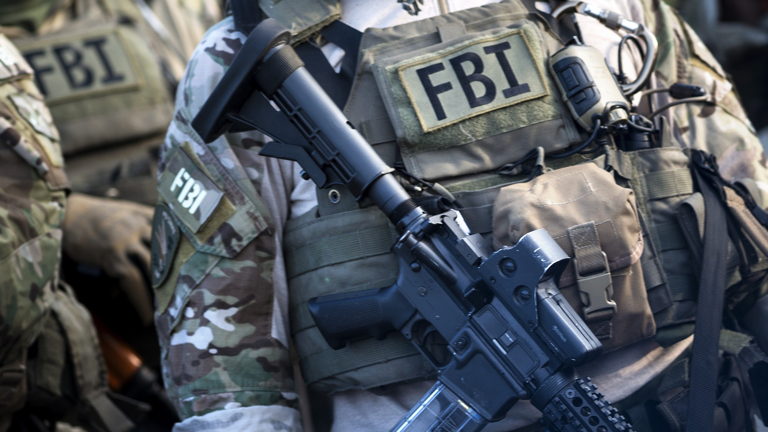 Members of a Federal Bureau of Investigation SWAT team are seen during an FBI field training exercise at the Landmark Mall on May 2, 2014, in Virginia. (BRENDAN SMIALOWSKI/AFP via Getty Images)