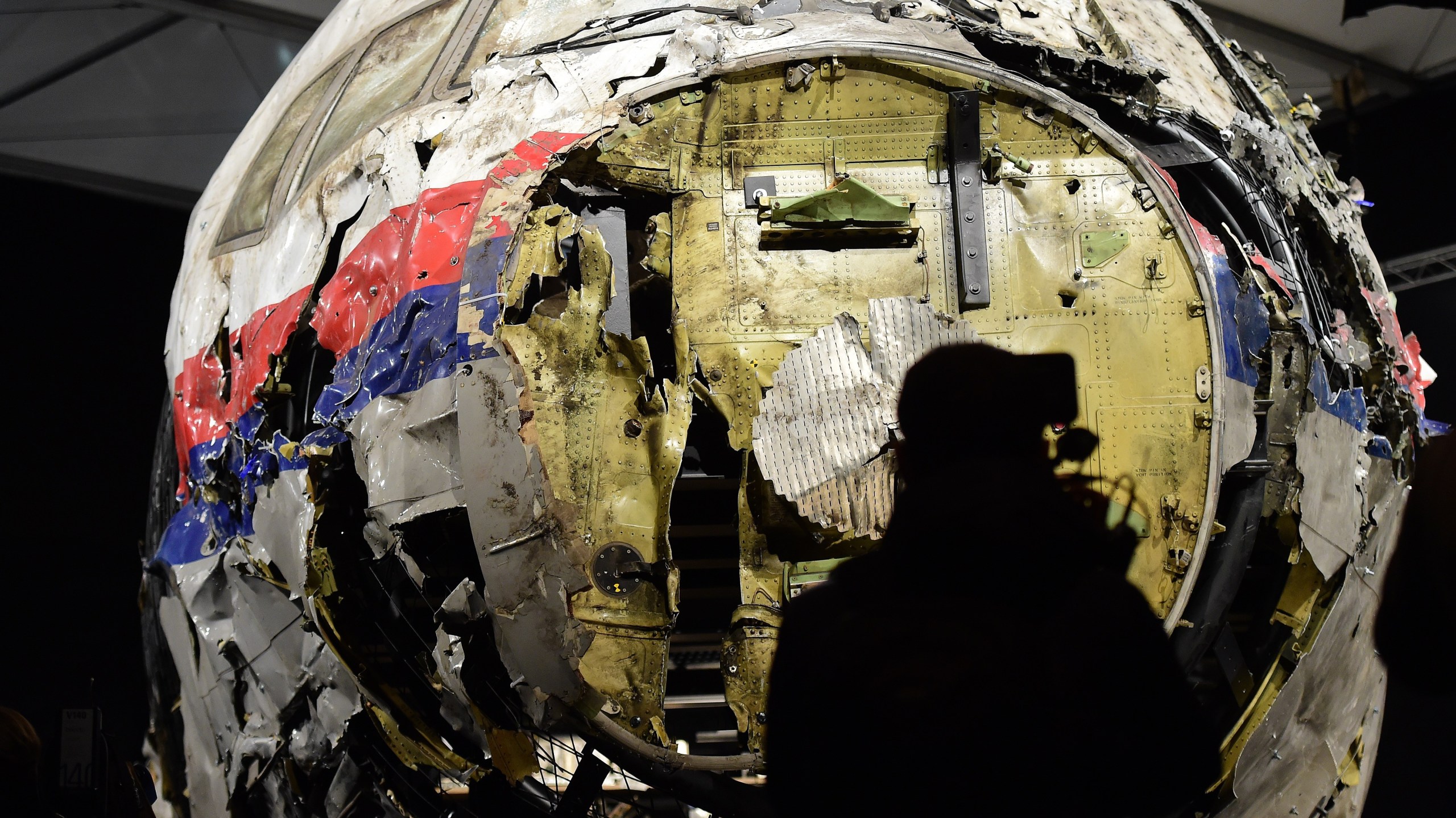 The wrecked cockpit of the Malaysia Airlines flight MH17 is presented to the press during a presentation of the final report on the cause of the its crash at the Gilze Rijen airbase October 13, 2015. (EMMANUEL DUNAND/AFP via Getty Images)