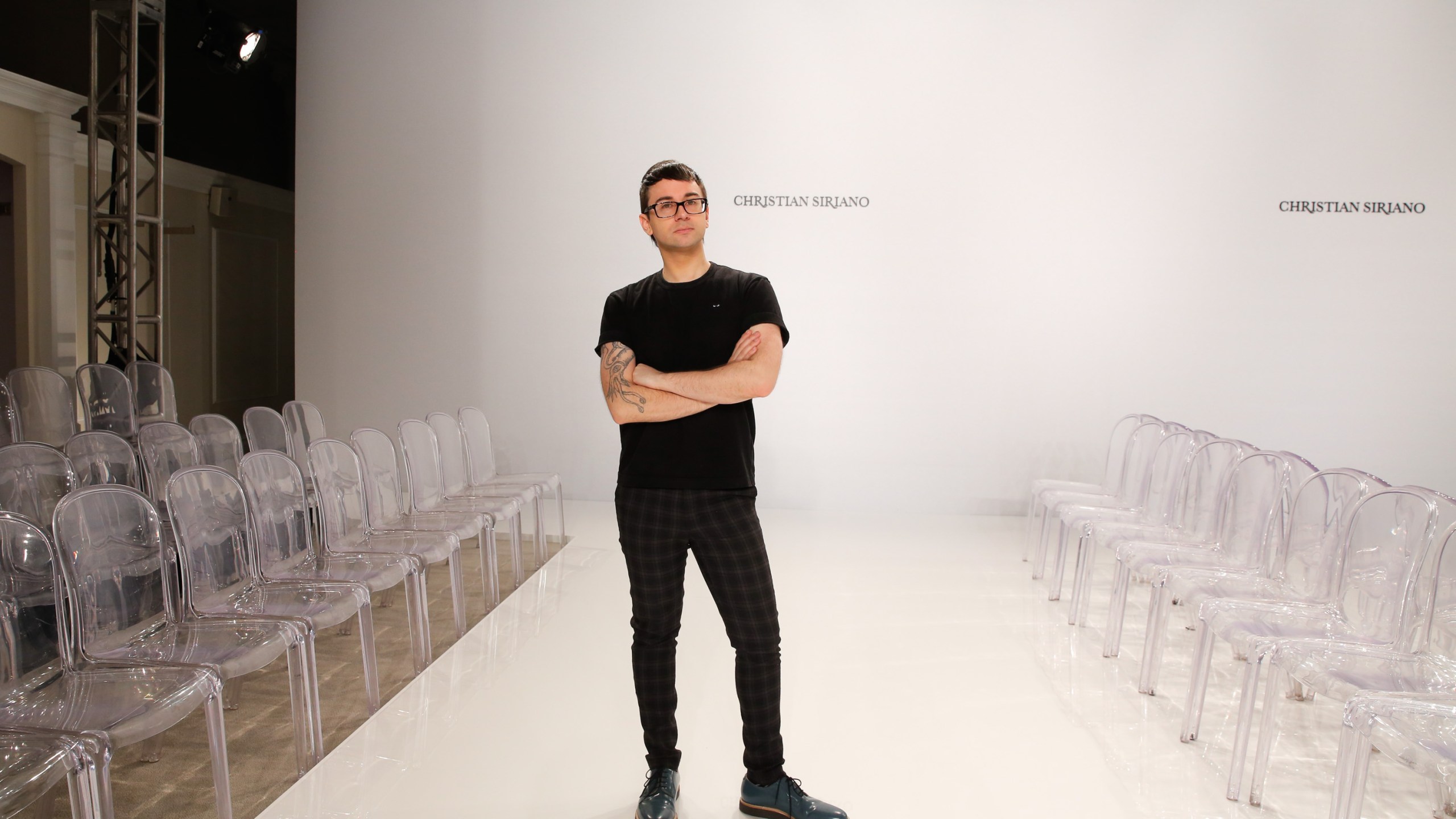 Designer Christian Siriano poses on the runway before his Christian Siriano For Kleinfeld Spring/Summer 2017 Bridal Collection at Kleinfeld on April 18, 2016 in New York City. (JP Yim/Getty Images)