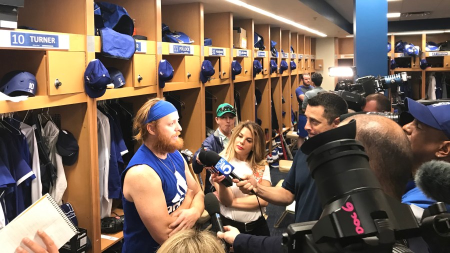 Dodgers player Justin Turner is interviewed by reporters during Spring Training at Camelback Ranch in , Phoenix, Arizona on Feb. 18, 2020. (Ismael Loya/KTLA) 